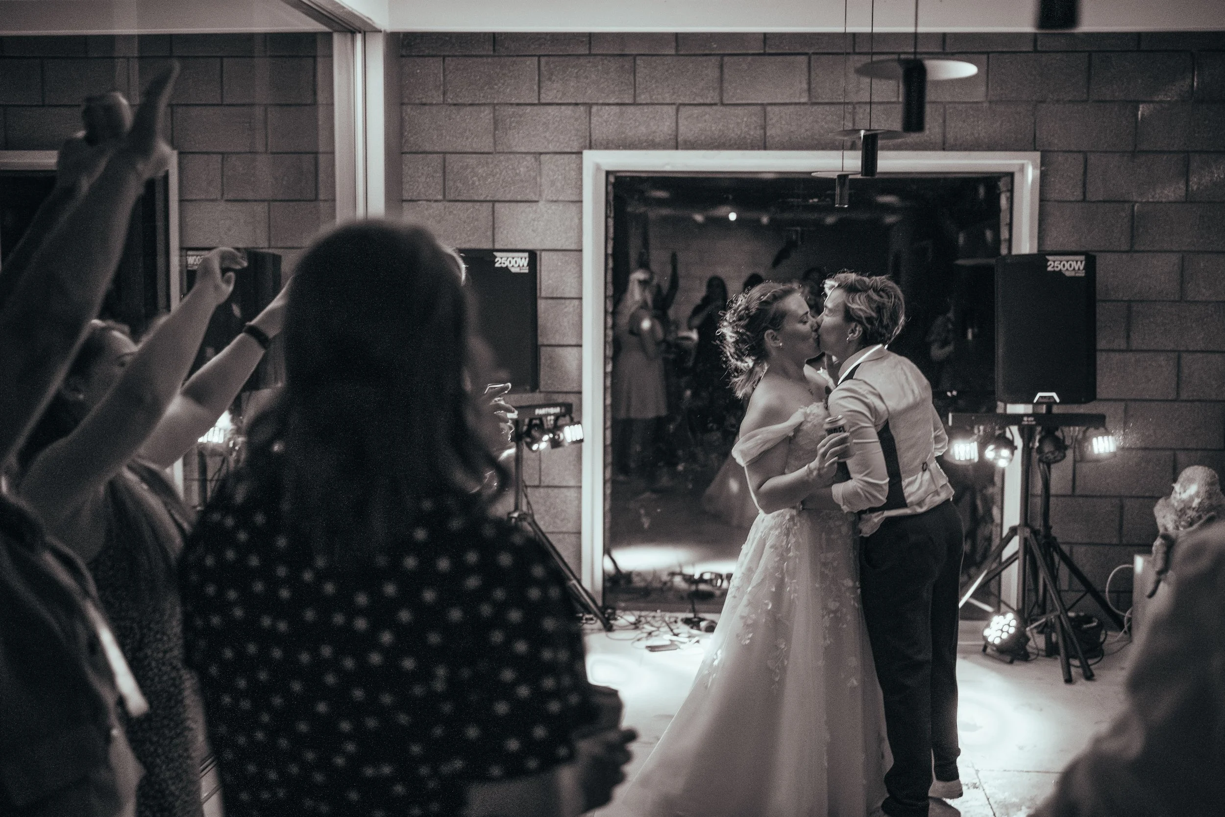 Lesbian wedding, kiss on the dancefloor, dancefloor black and white photography