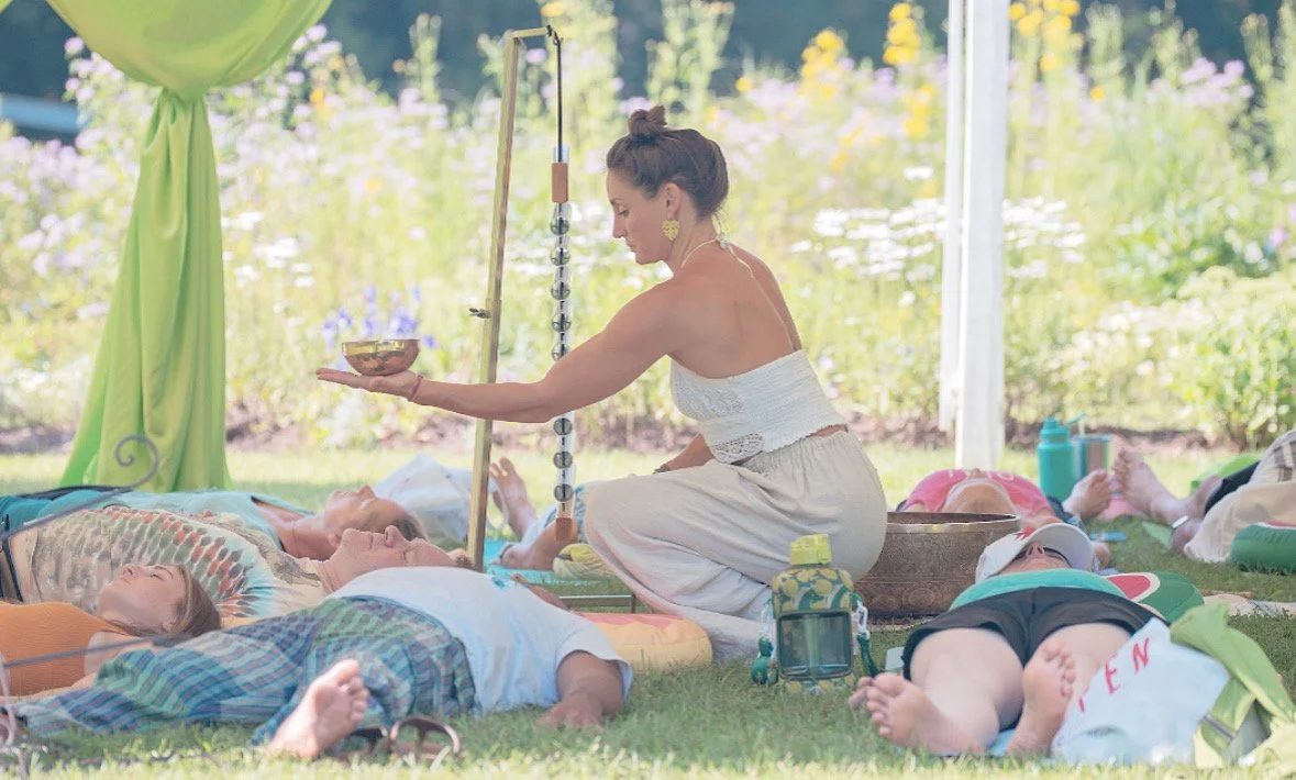 SOUND Sama hold bowl group photo.JPG