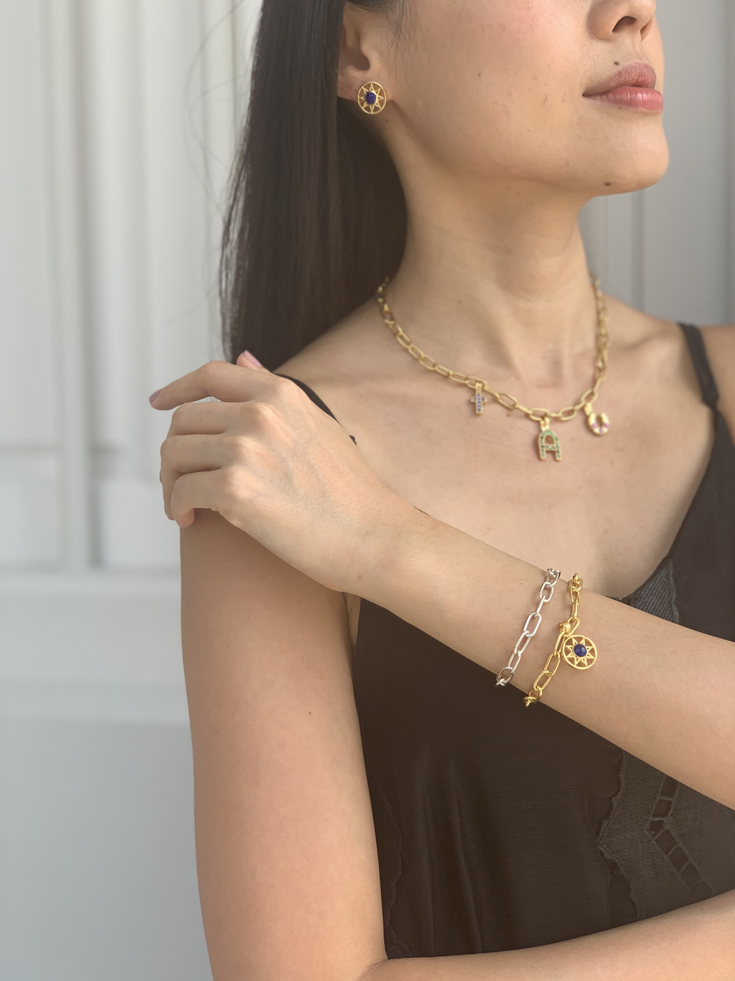 cross charm model shot1.jpeg