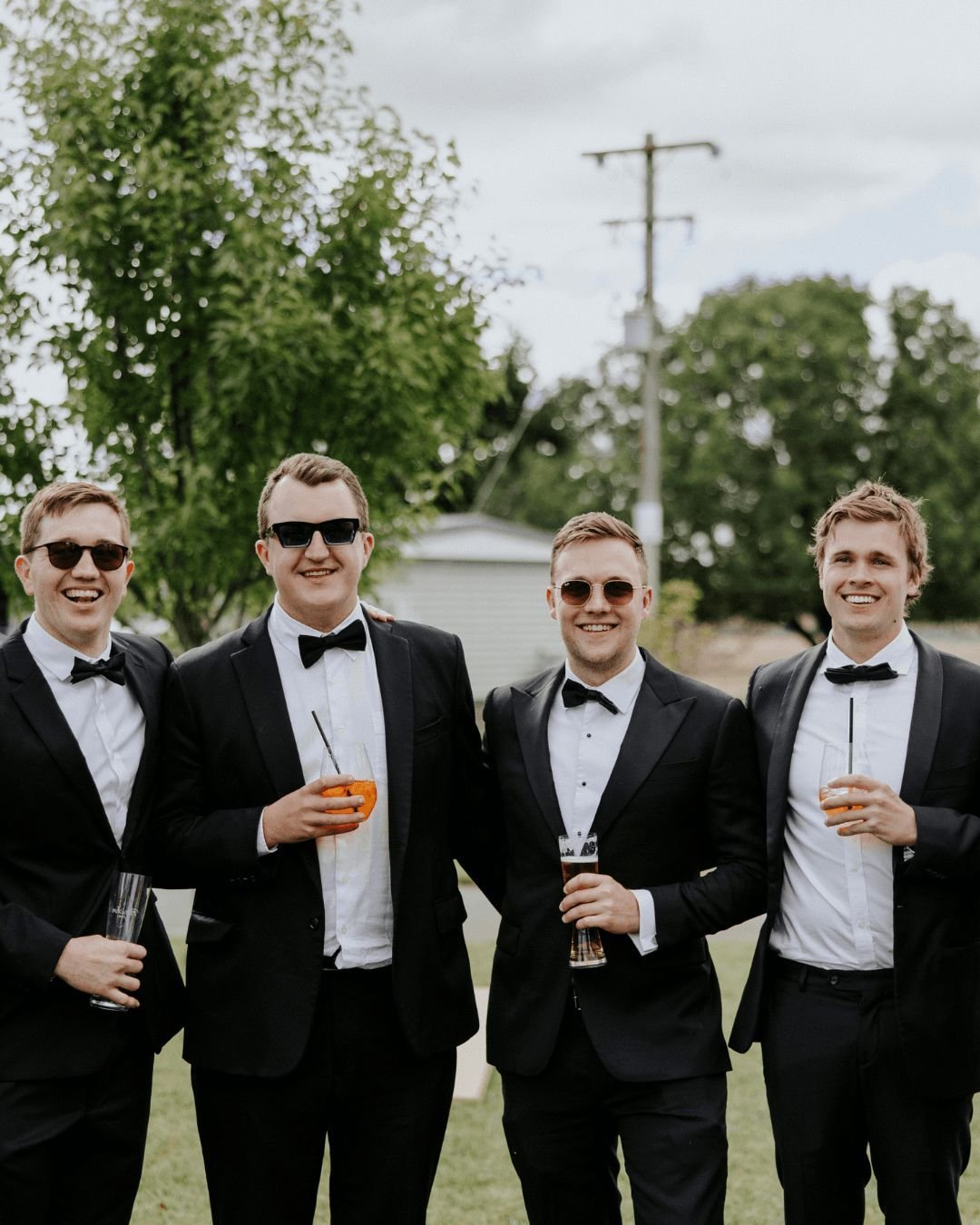 Who says elegance can't meet rustic charm? 🌾✨ At Petrichor Farm, we blend the sophisticated allure of black tie events with the natural beauty of the countryside. Witness men in sleek tuxedos against a backdrop of rolling fields and sunset hues&mdas