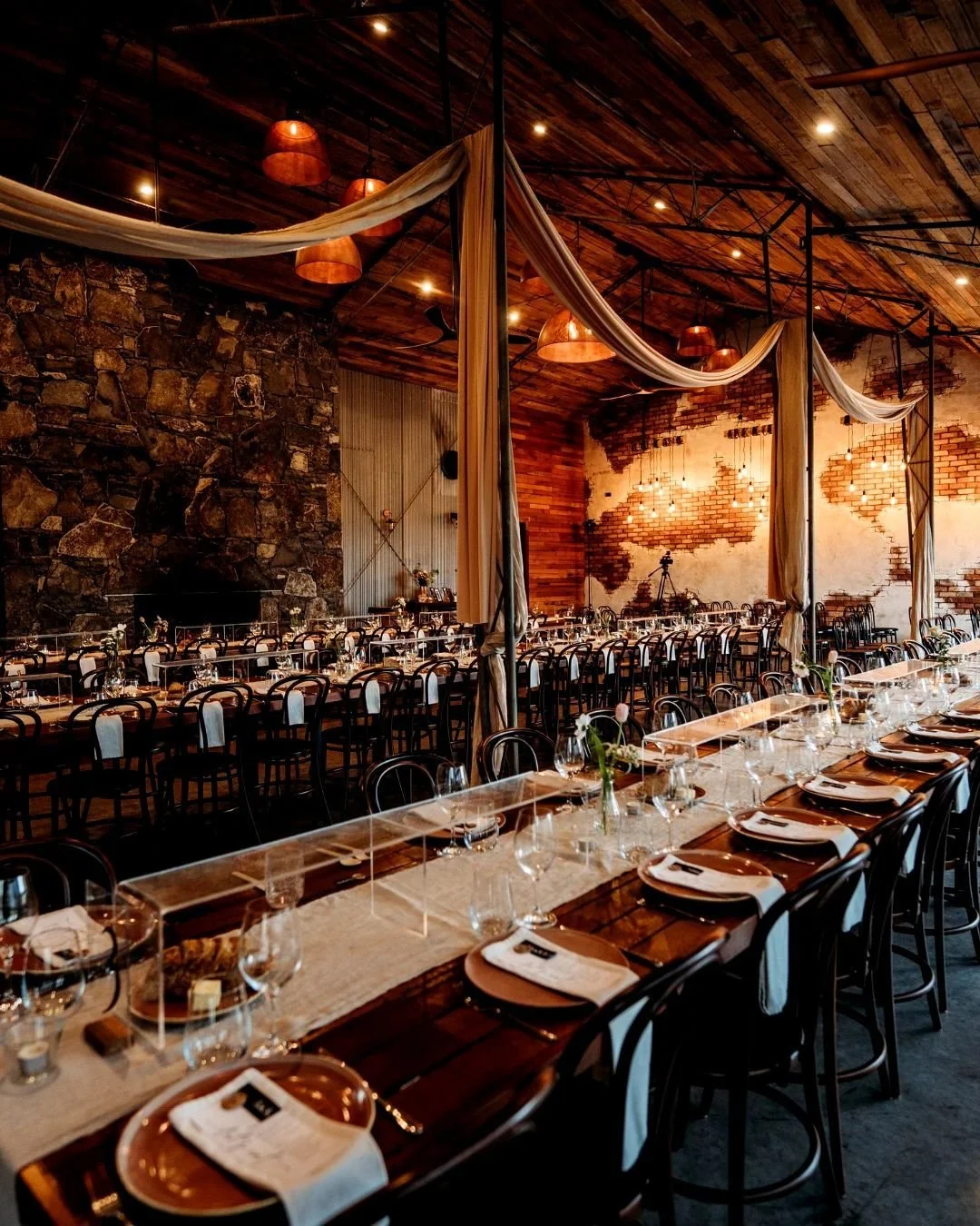 Step inside&hellip; and exhale 🤍
Our reception space at Petrichor farm  strikes that sweet spot, rustic meets luxe, warm meets wow. Think polished concrete floors, timber textures, soaring ceilings, and soft light that makes everything (and everyone