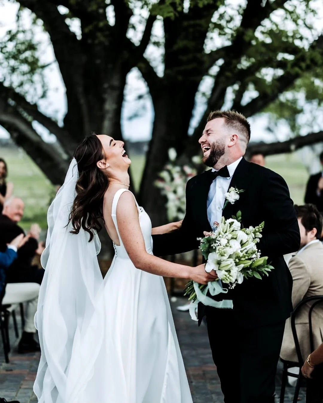 Anjel &amp;  Jaydn, pure sunshine ✨
Just moments after saying &ldquo;I do,&rdquo; these two dissolved into the kind of belly laugh that fills the whole paddock. The nerves had lifted, the confetti had settled, and all that was left was joy, loud, unf