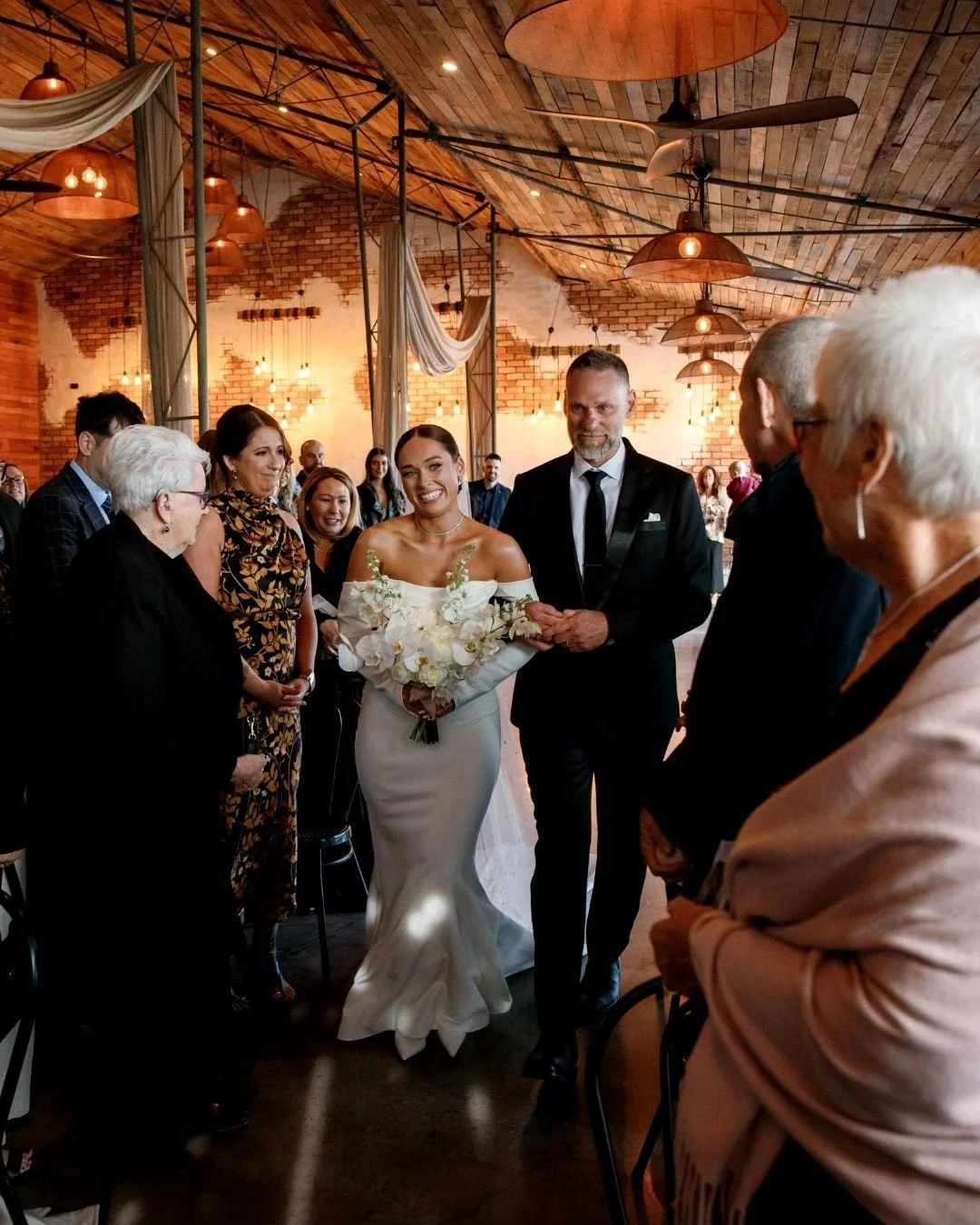 One photo can capture a moment.
Ten photos can tell a story.
The nervous excitement while getting ready. The look on your partner's face when they first see you. The squeeze of a hand during the ceremony. The tears, the laughter, the hugs, the dance 