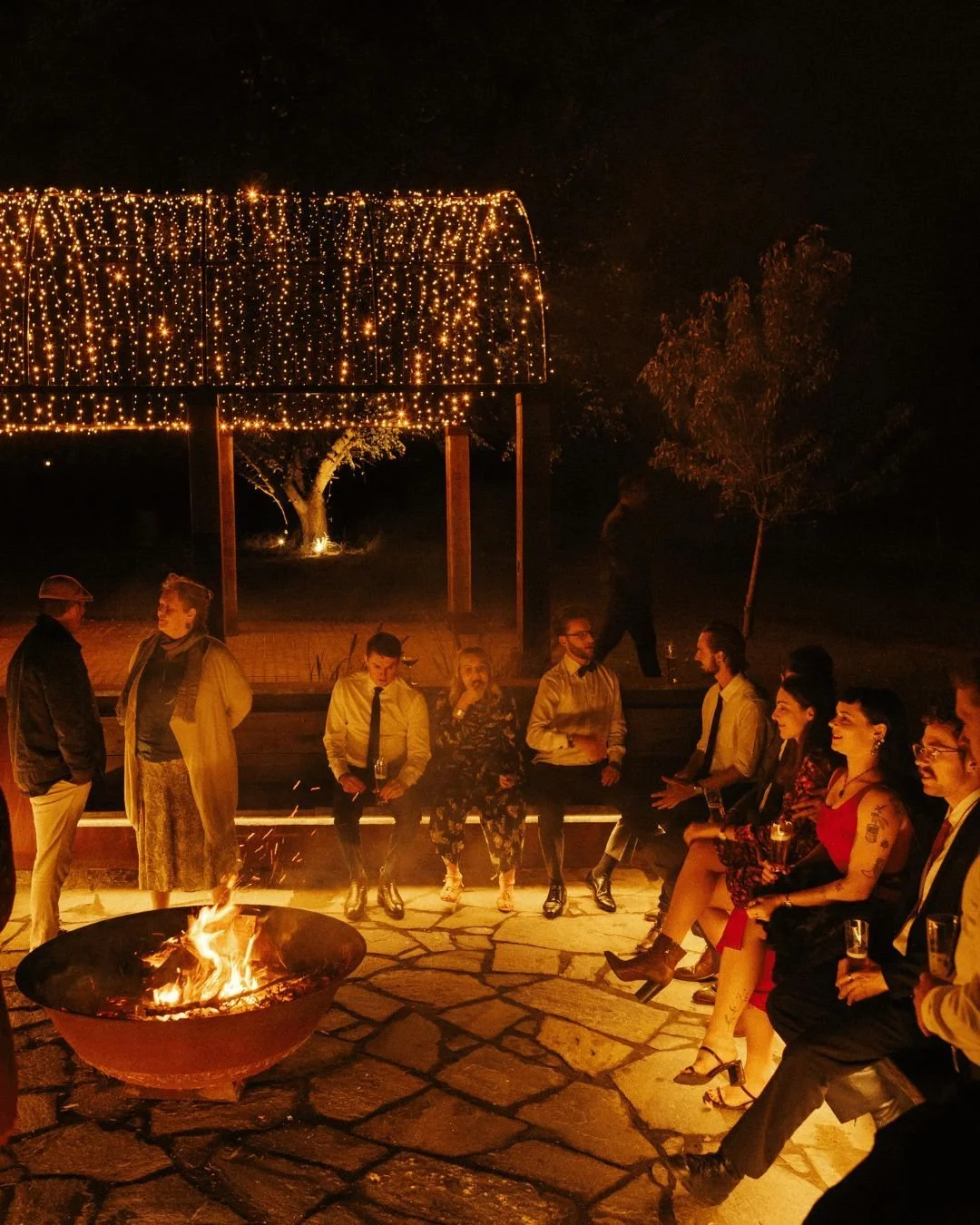 The best part of the night isn't always on the run sheet.
It's when the formalities are done, shoes come off, drinks are topped up, and everyone finds their way to the fire.
The conversations slow down, the laughter gets louder, and the night lingers