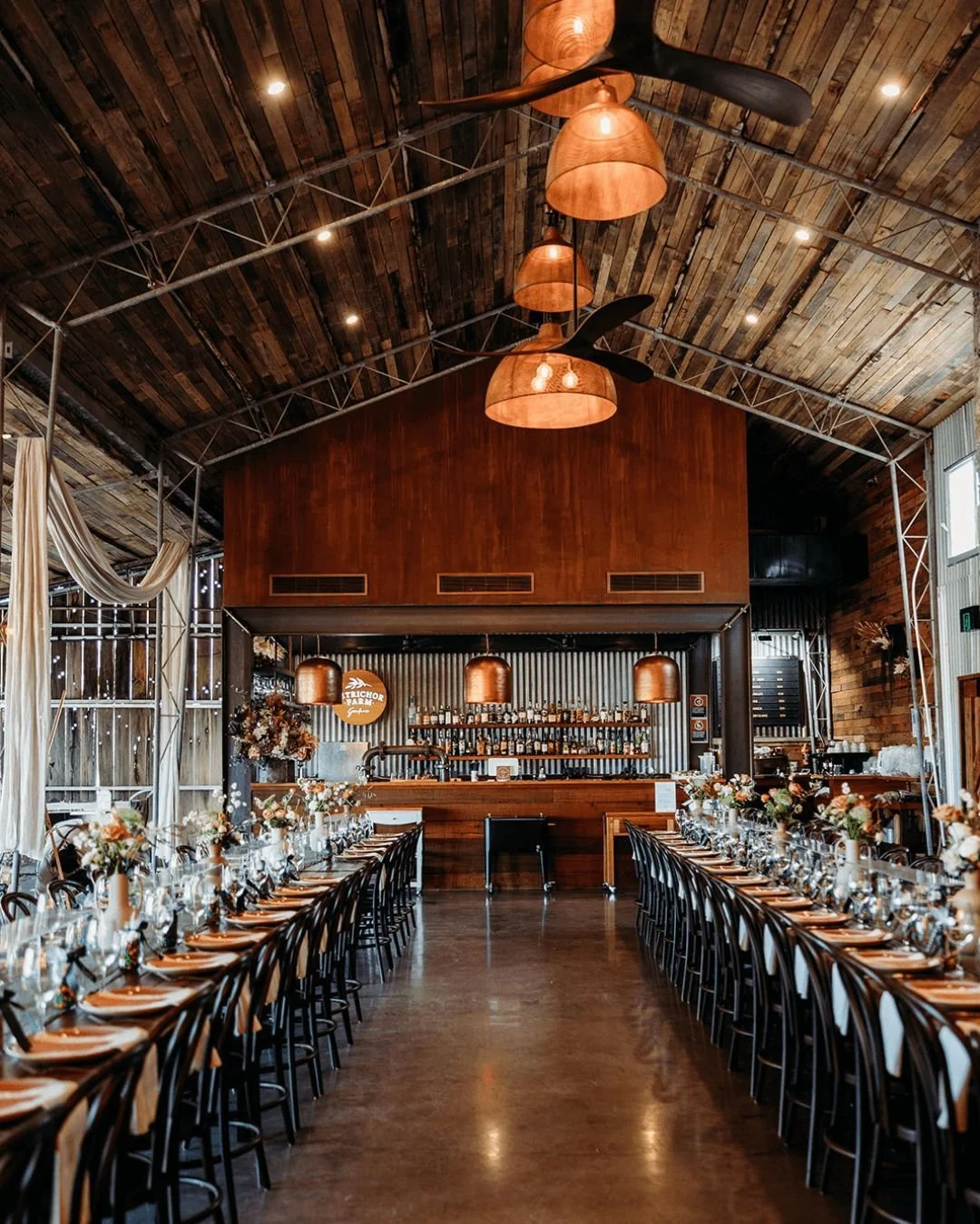 Not every wedding venue was designed for weddings. Petrichor Farm was.
Purpose-built with celebrations in mind, our rustic wedding venue blends warm timber, soaring ceilings, and beautiful countryside views to create a space that feels both relaxed a