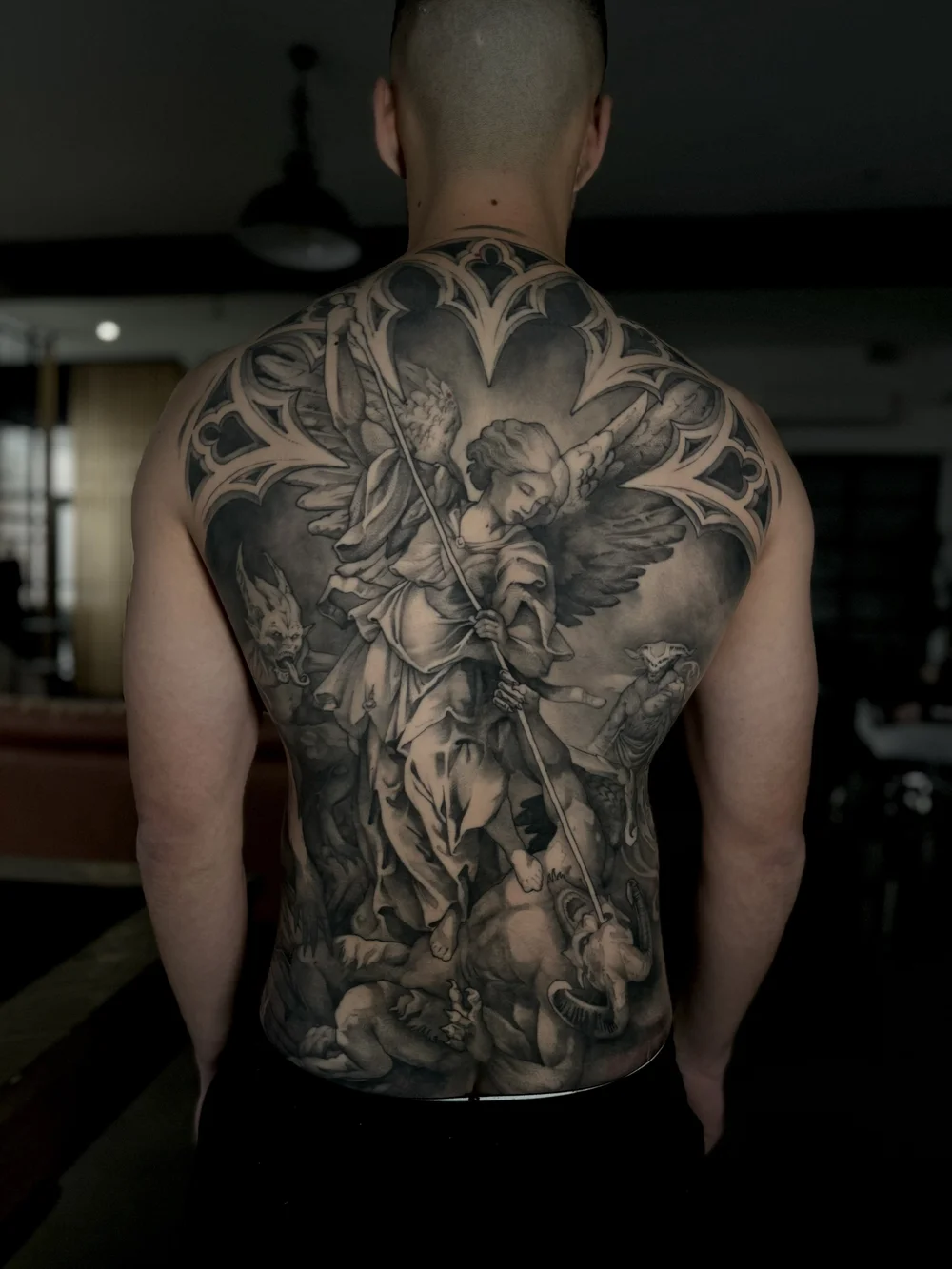 Black and grey tattoo by Cody Wilson