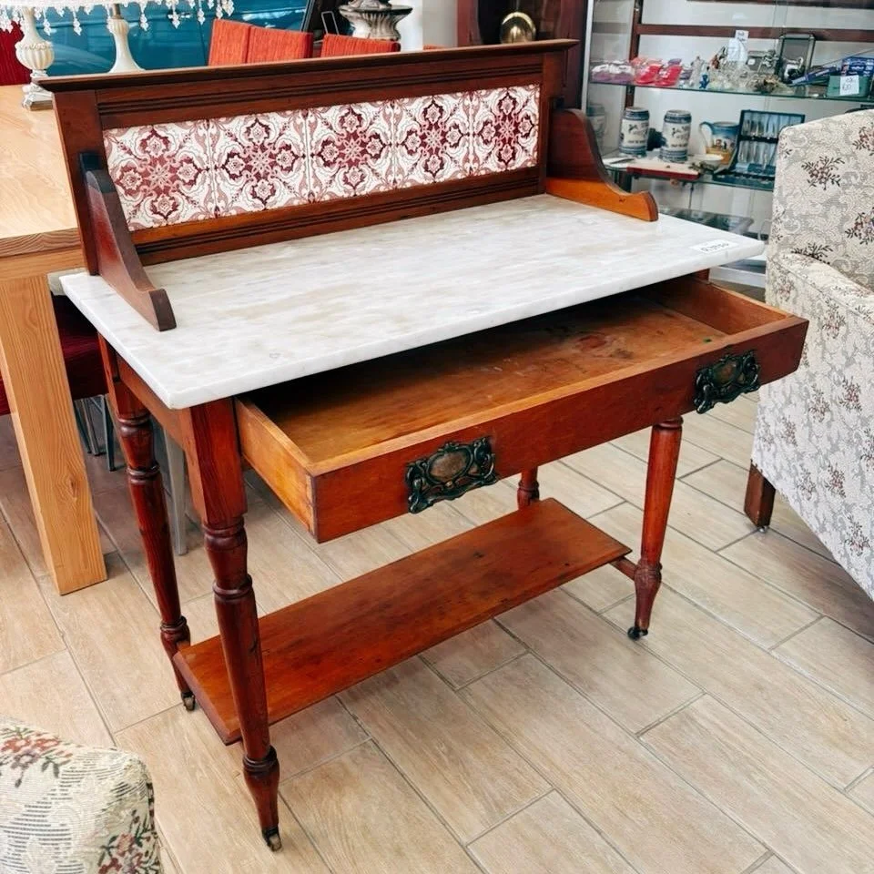 We have this beautiful old wash stand available.

Made from different wood types with some slightly faded tyles, some more than others. 

Great overall condition.

Price: R3950

L-915mm
D-460mm
H-790mm (table top)
