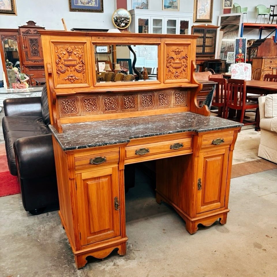 Beautiful washstand available with a charcoal marble top and light brown/tan tiles, finished with a bevelled mirror.

Very well looked after.

Price: R8950

Dimensions:
L-1,22m
D-615mm
H-820mm(table top)
H-1,42m(with back)