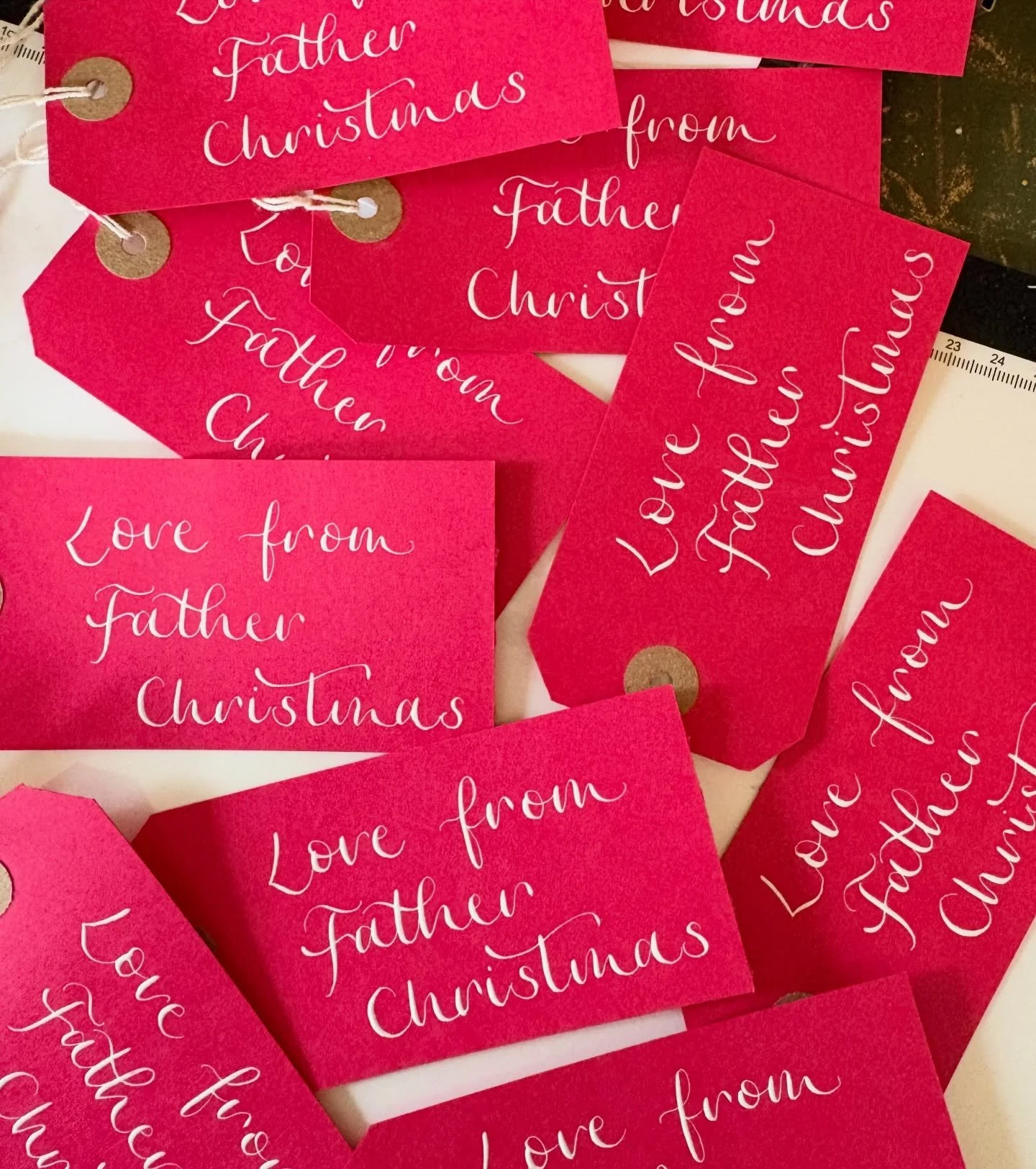 L A B E L S 🎁 sending out all my @holly.co orders including these big red labels which are hopefully helping the big man get ready for Christmas Eve ✨ 
&bull;
&bull;
#calligraphy #christmasstocking #fatherchristmas