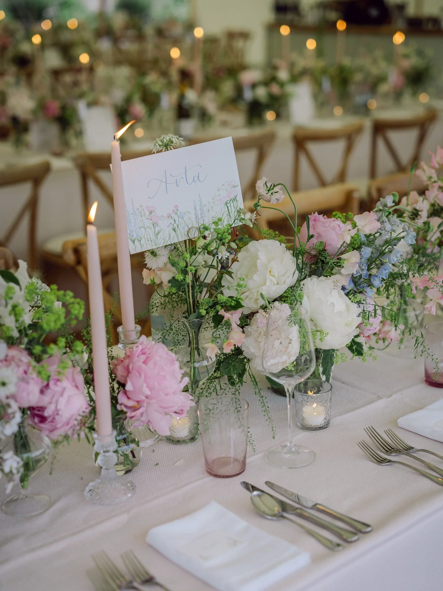 T A B L E  N A M E S 🌸 for C&amp;D, sitting very happily amongst the BEAUTIFUL flowers created by @mill.rich.flowers
&bull;
📸 @bizzyarnottphotography 
&bull;
#calligraphy #weddingcalligraphy #personalisedstationery #bespokestationery