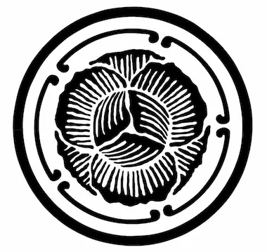 Een zwart-wit afbeelding van een bloemkool motief met een centrale cirkel en bloembladen omgeven door een rand. Kool Design logo