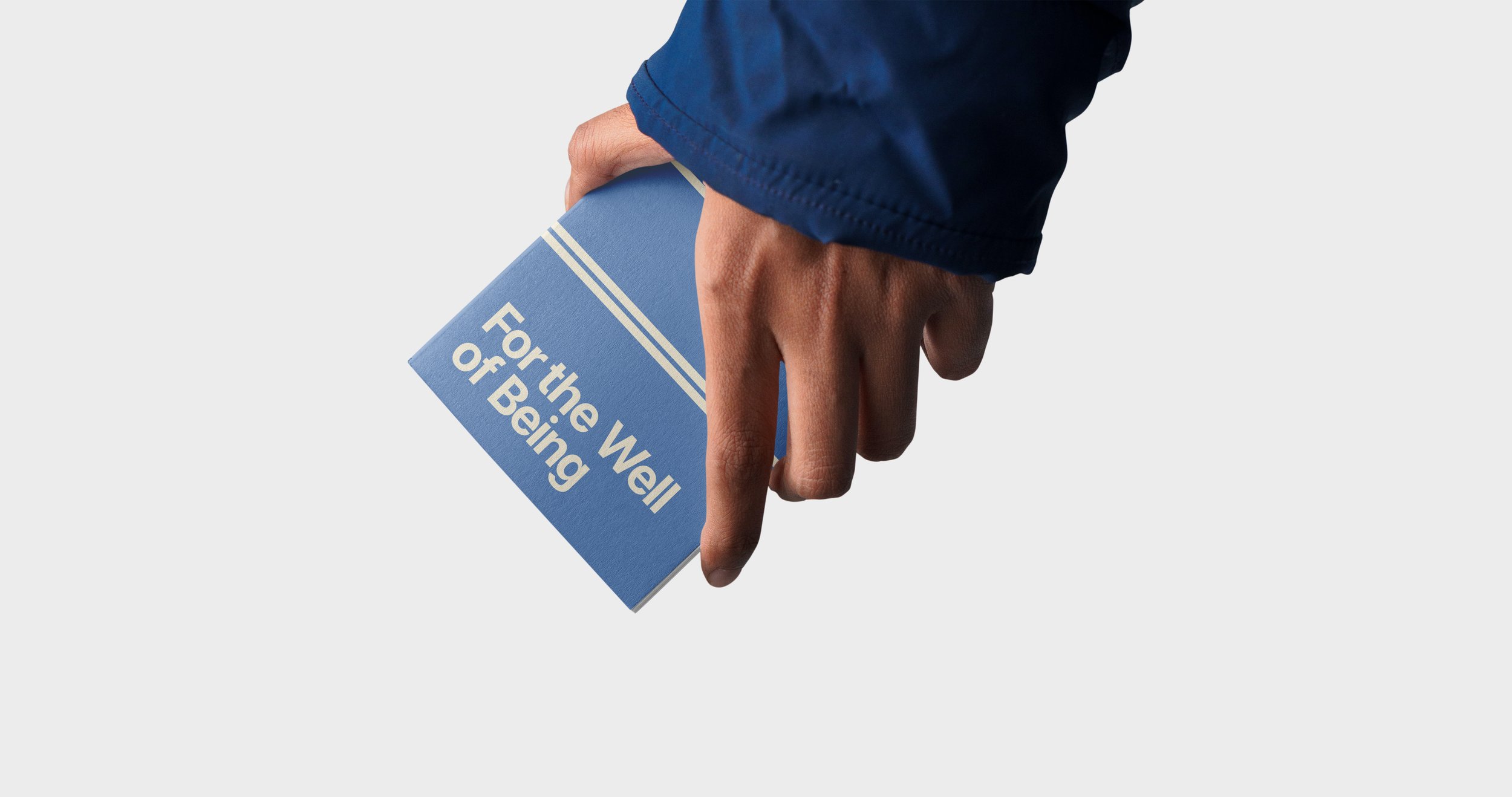 Free A5 Notebook in Hand Mockup copy.jpg