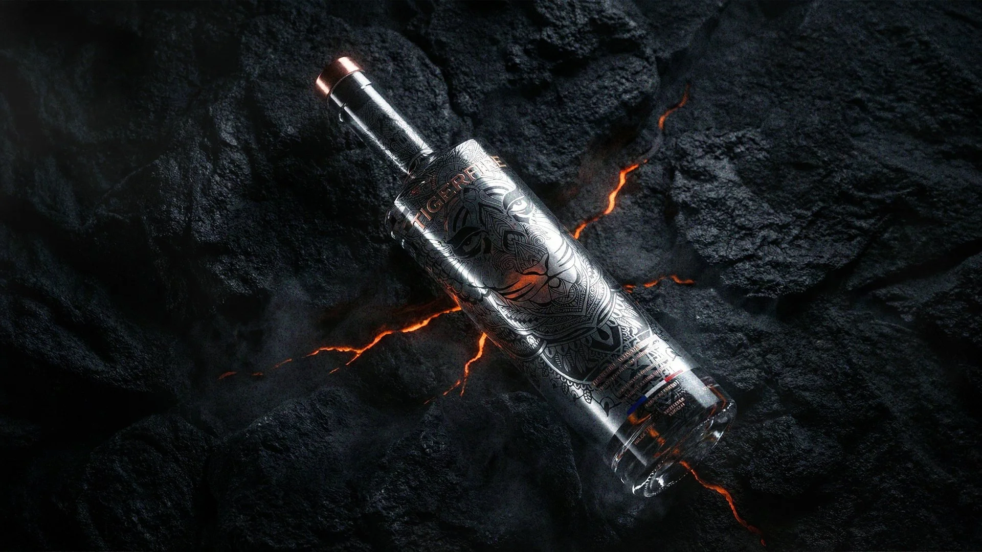 A tiger-themed metal tumbler lying on black volcanic rocks with glowing orange cracks.