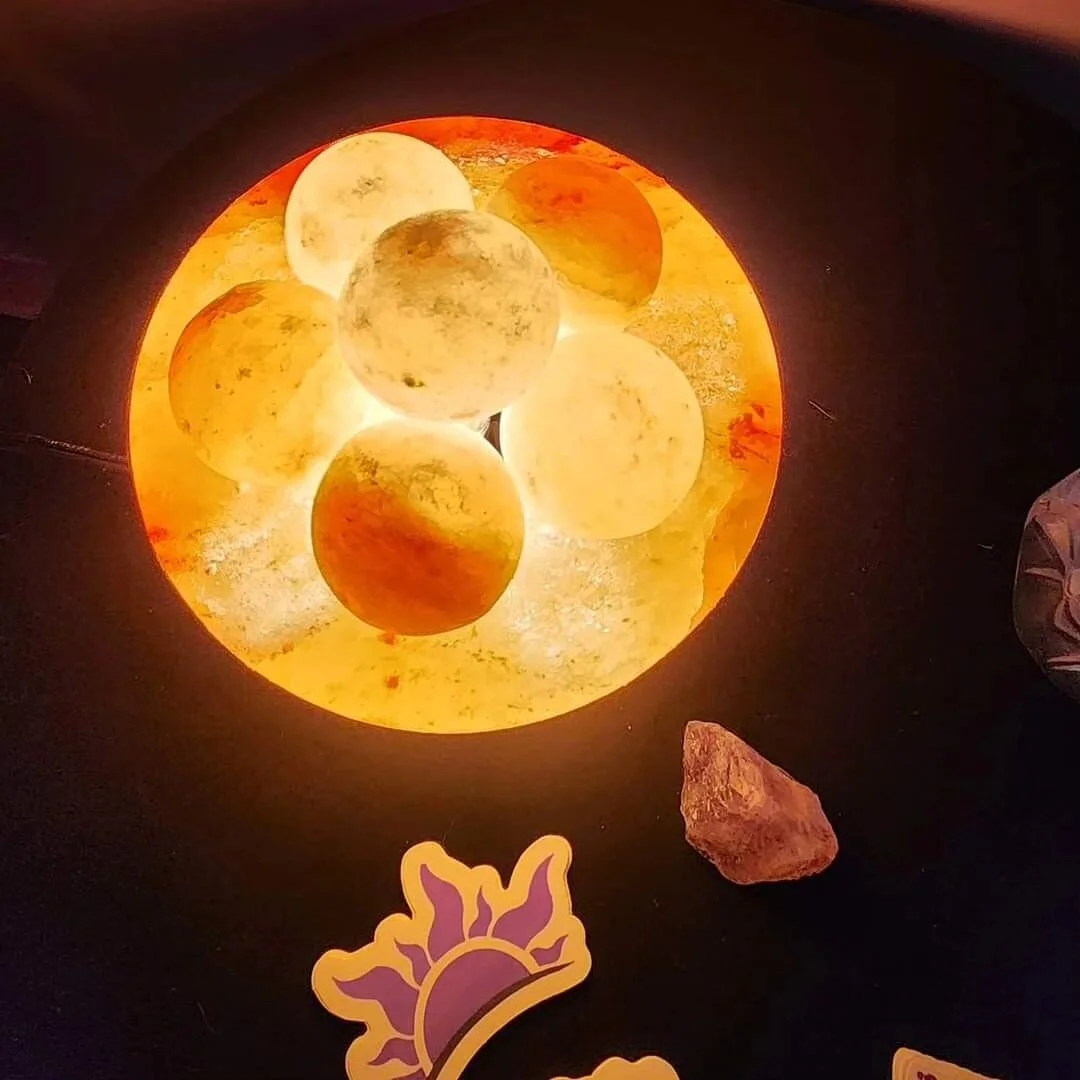 This is Abunduance bowl, pure pink himalayan salt balls warmed up inside of the bowl that help sore hands, detox hands, and soothe hands. 
This will be inside of our salt cave free to use as well as our himalayan pink foot domes.
The salt cave is in 
