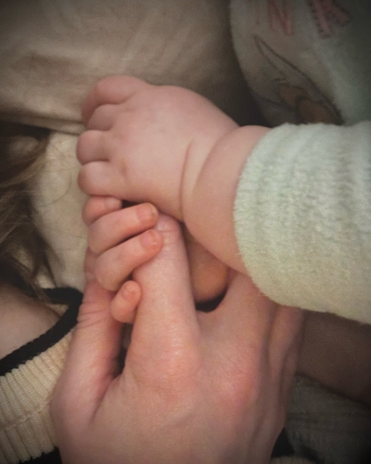 Seven years into sleep deprivation. As soon as one child slept, she passed the baton to the next. 

Could I be that unlucky, I ask?

Or perhaps the fact I have the privilege of holding this chubby, warm little hand in mine, listening to her breathing