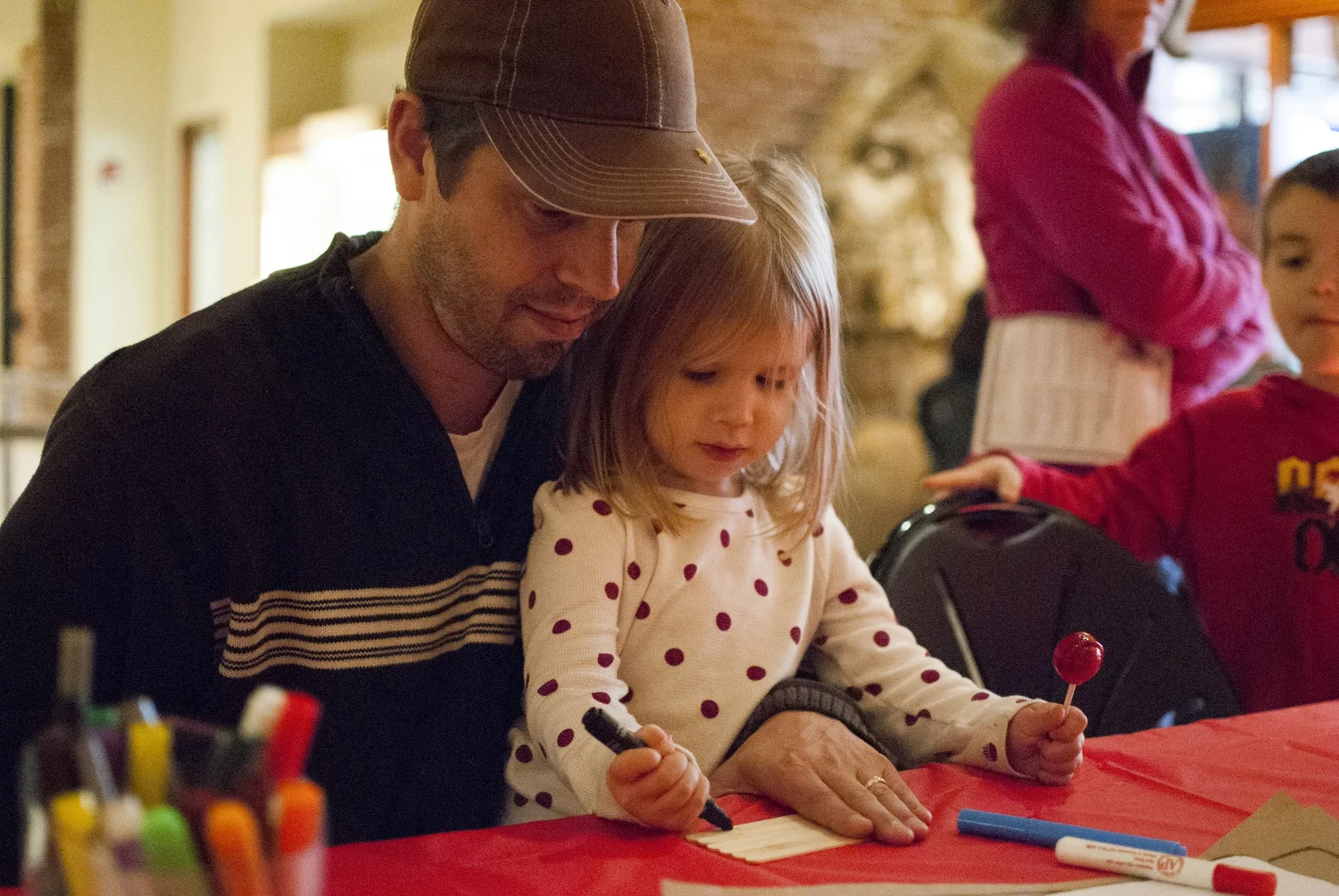 A father and daughter at the museum