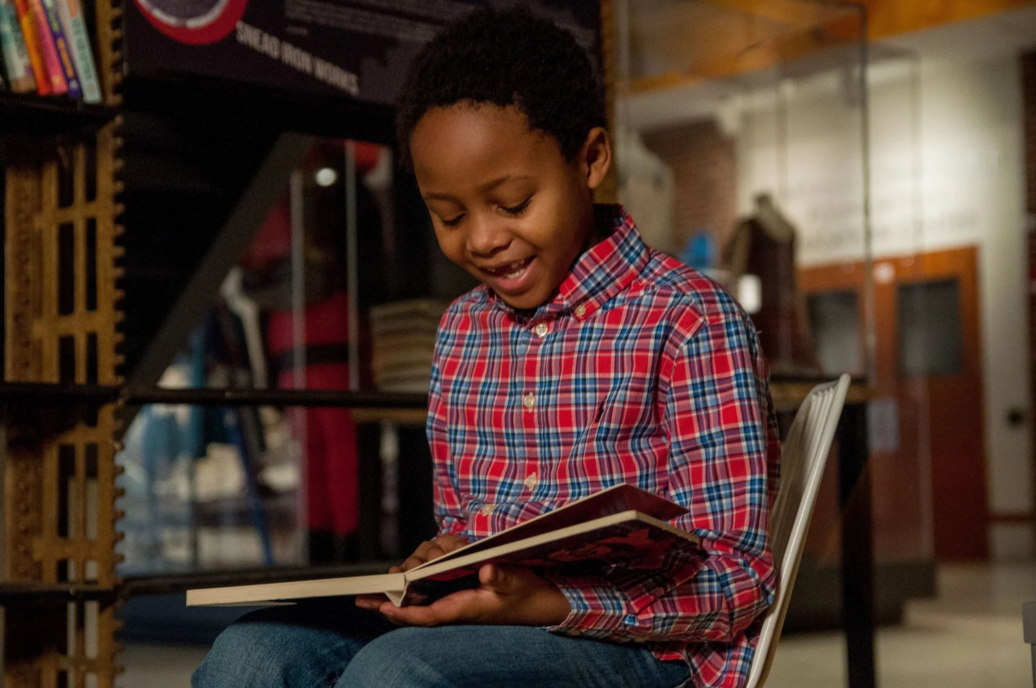 A child reading at the museum