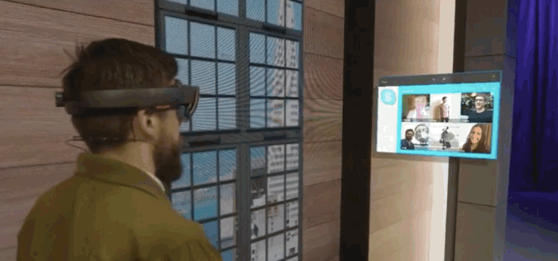 User interacting with the environment wearing Microsoft HoloLens.