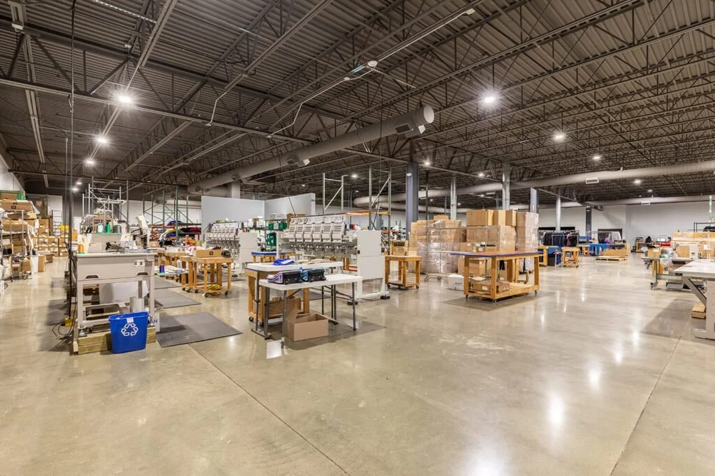 staff-only back room for packaging, where form function studio completed space planning services at level 10 apparel