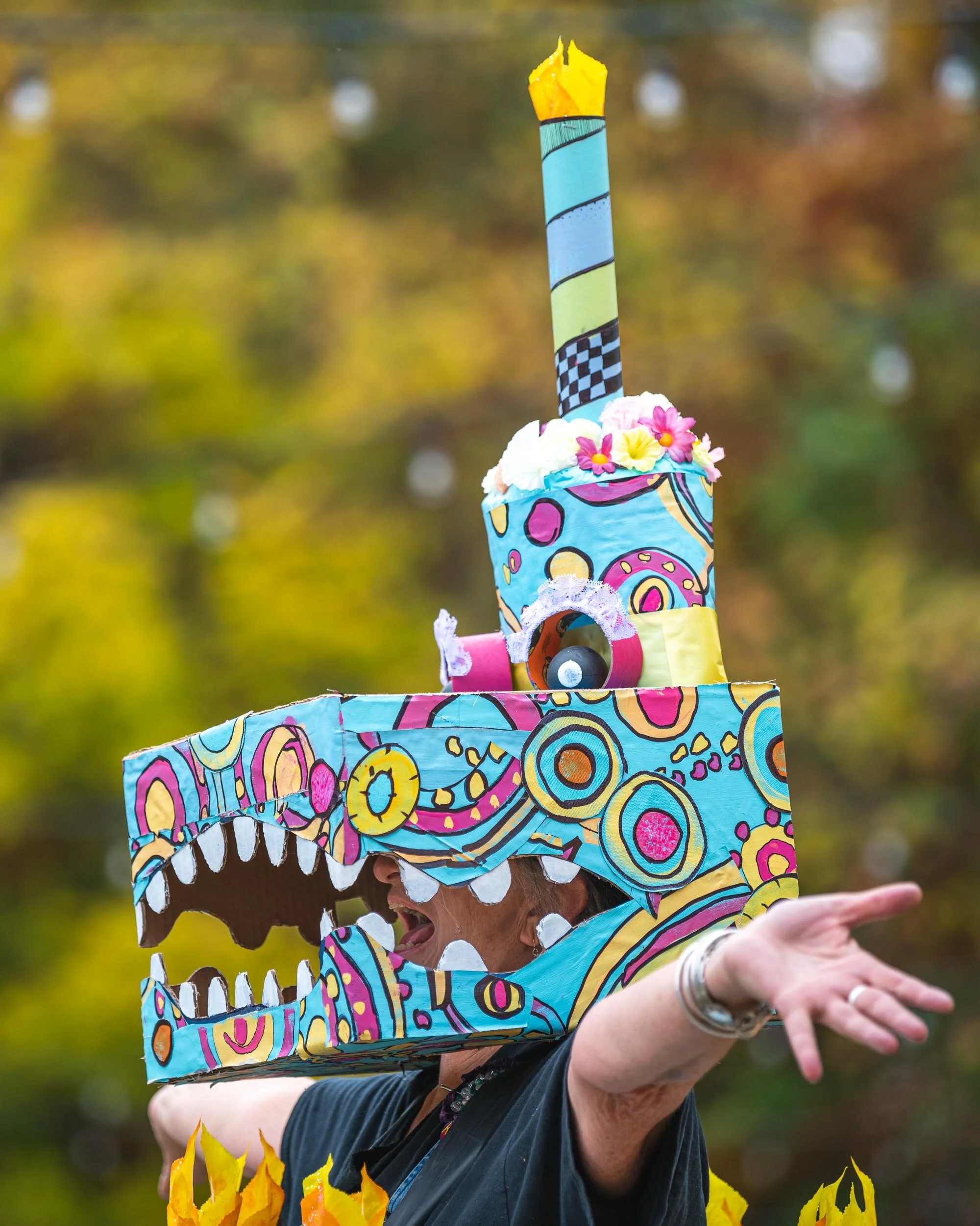 Tina Kelsey stands in Armory Park in Athens, Ohio, trying out one of the costumes made for the 2019 Honey for the Heart parade, Friday, October 25, 2019. Every year, the parade has a different theme and the theme this year is "party".