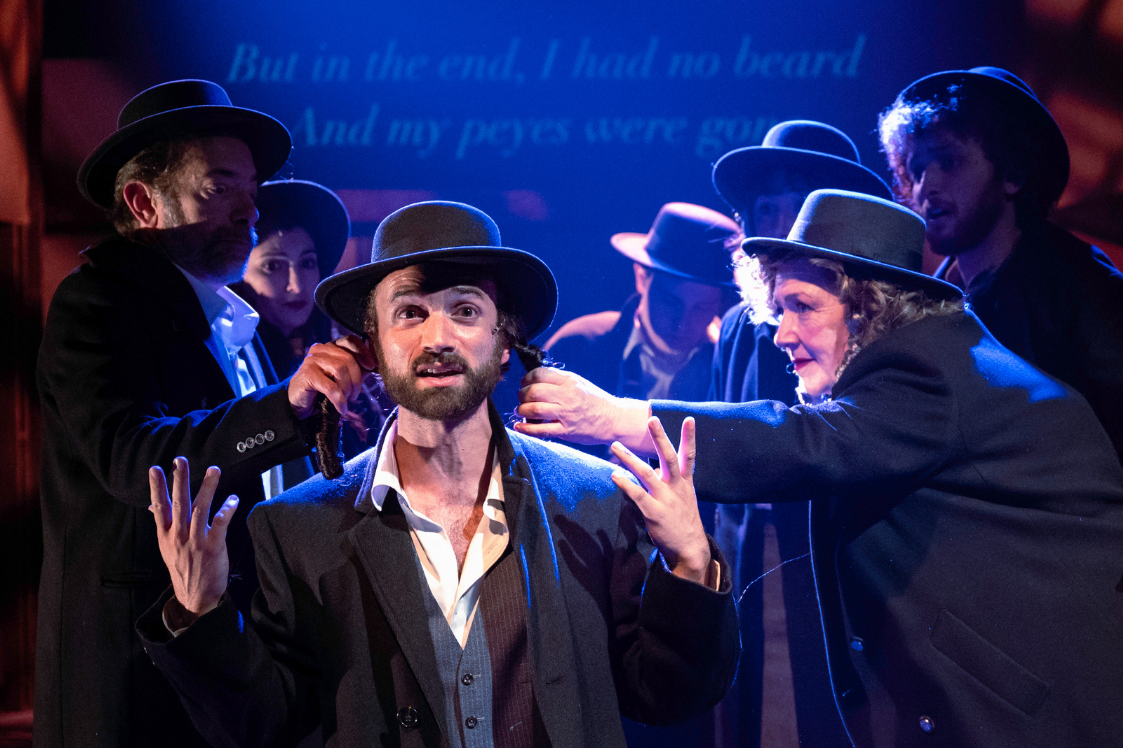 (l-r) Zach Brewster-Geisz, Lauren Hart, Stephen Russell Murray, Ben Ribler, Lily Burka, Nicole Halmos, and Ethan J. Miller in Indecent, June 4 - 28. Photo by Teresa Castracane Photography.