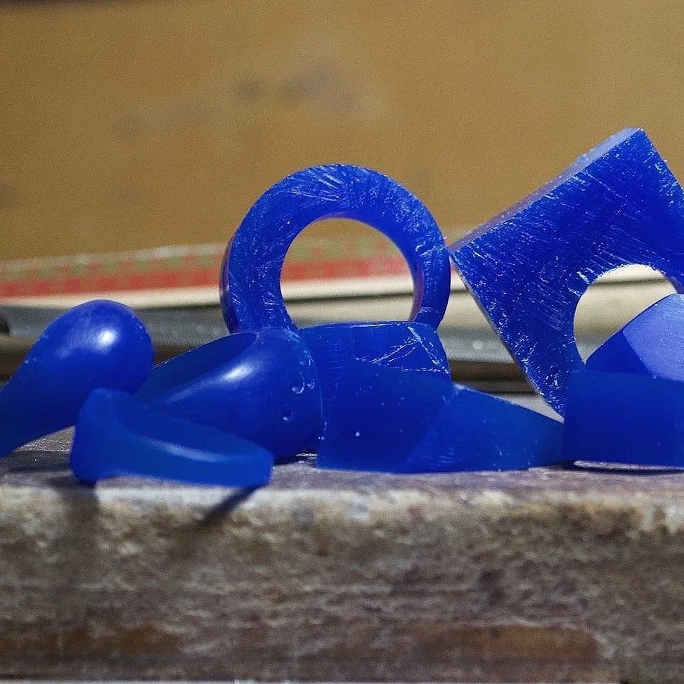 Student practising wax carving during jewellery training in Greece