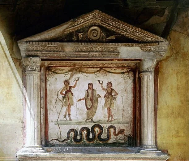 Shrine-of-the-household-gods-in-the-House-of-the-Vettii-Pompeii.-credit-Werner-1.jpg