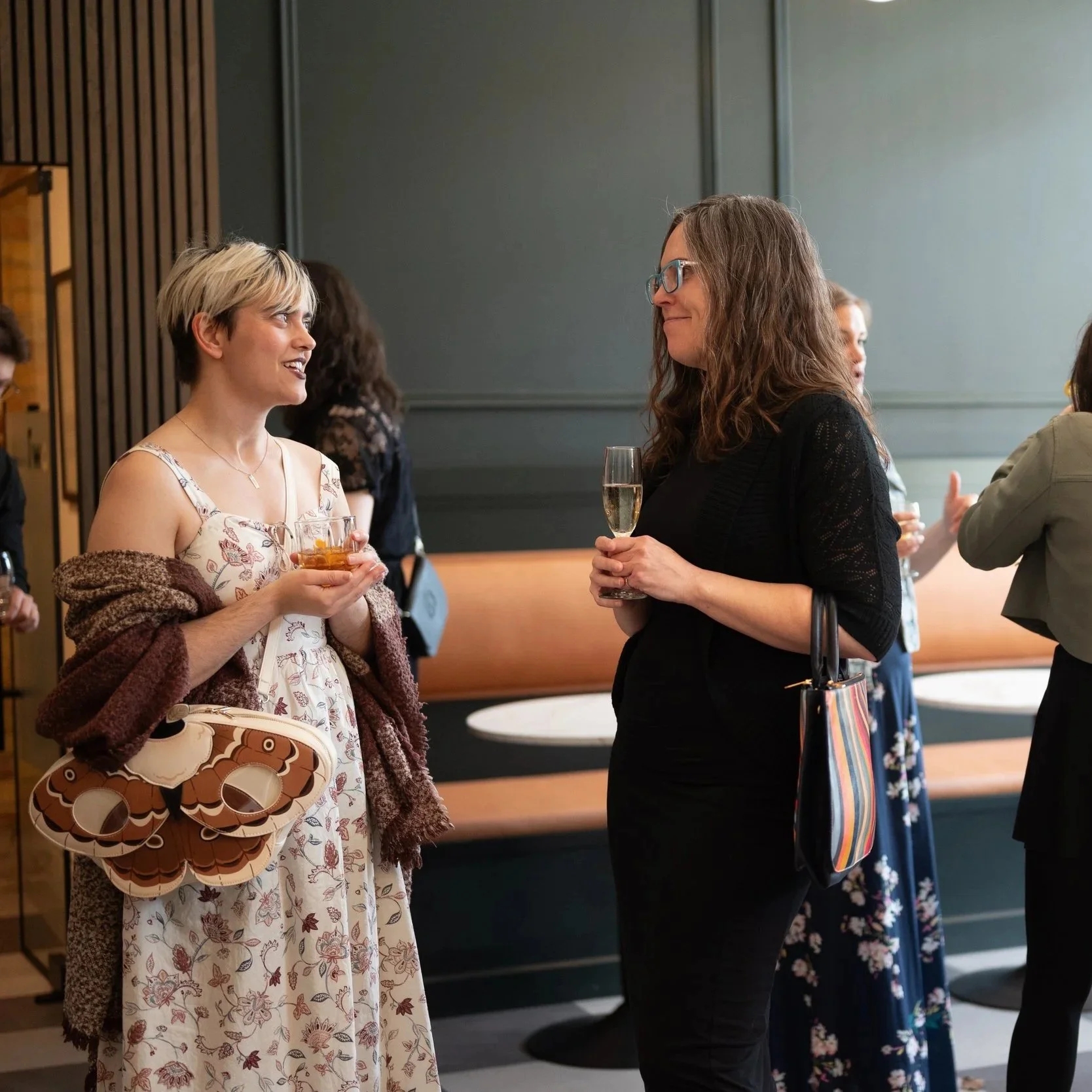 Coworking members socializing at an event