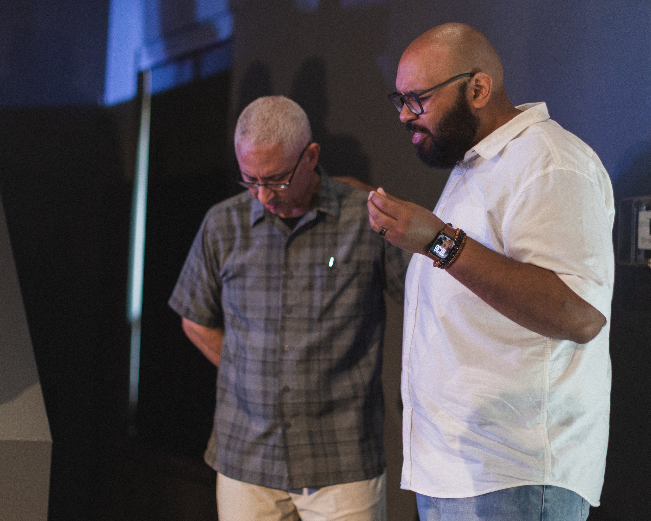 People praying for each other at Bethel Assembly Church in Elmhurst, IL.