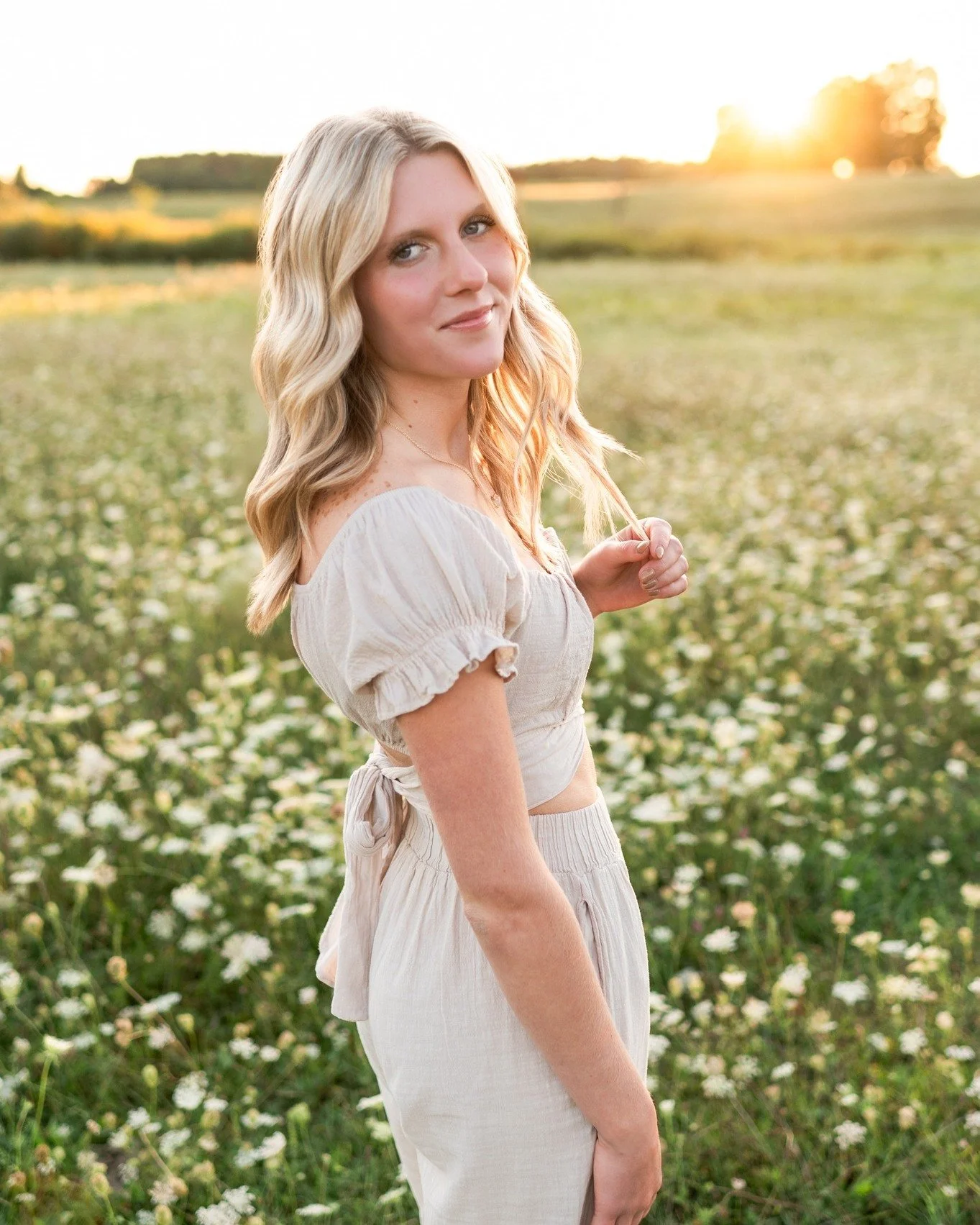 Elly Erbes | Class of 2026 | Reed City High School

What a truly stunning session this was! Full of golden light and an even more beautiful senior, inside and out! Elly absolutely shined during her summer senior session, and I can&rsquo;t wait to see