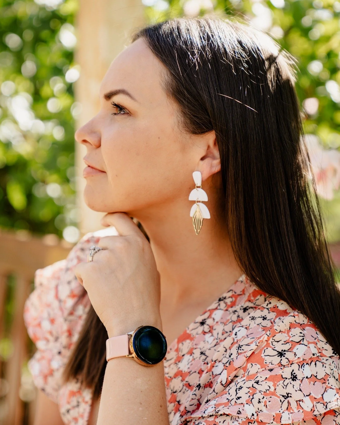 The essential statement earring! 
White Jazz dangles are so easy to pair with your outfits.

The middle piece features a beautiful textured floral pattern. 
The gold-plated charm adds a beautiful touch on the bottom.
These are so light and have a bea