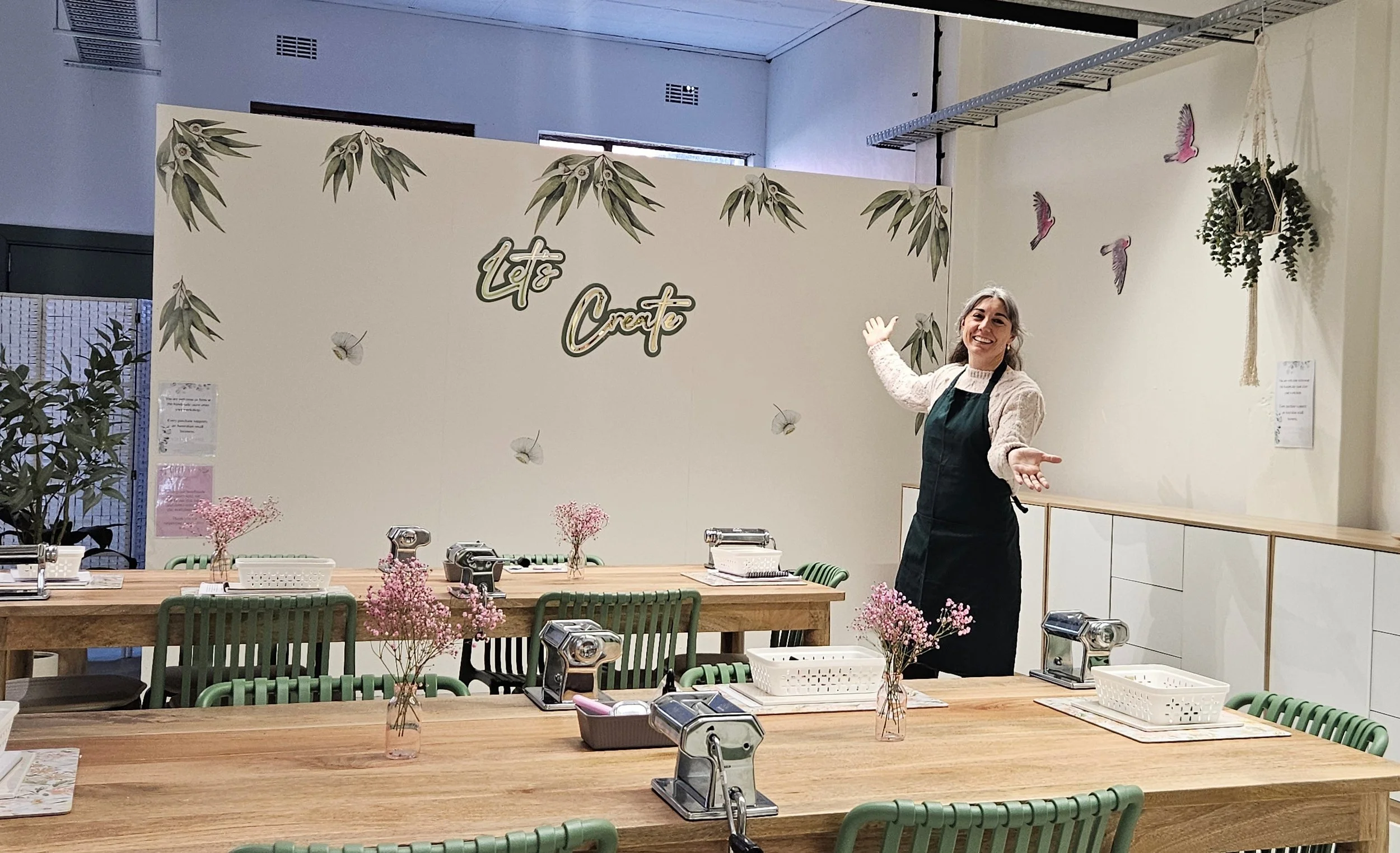 bobbie in workshop open arms.jpg