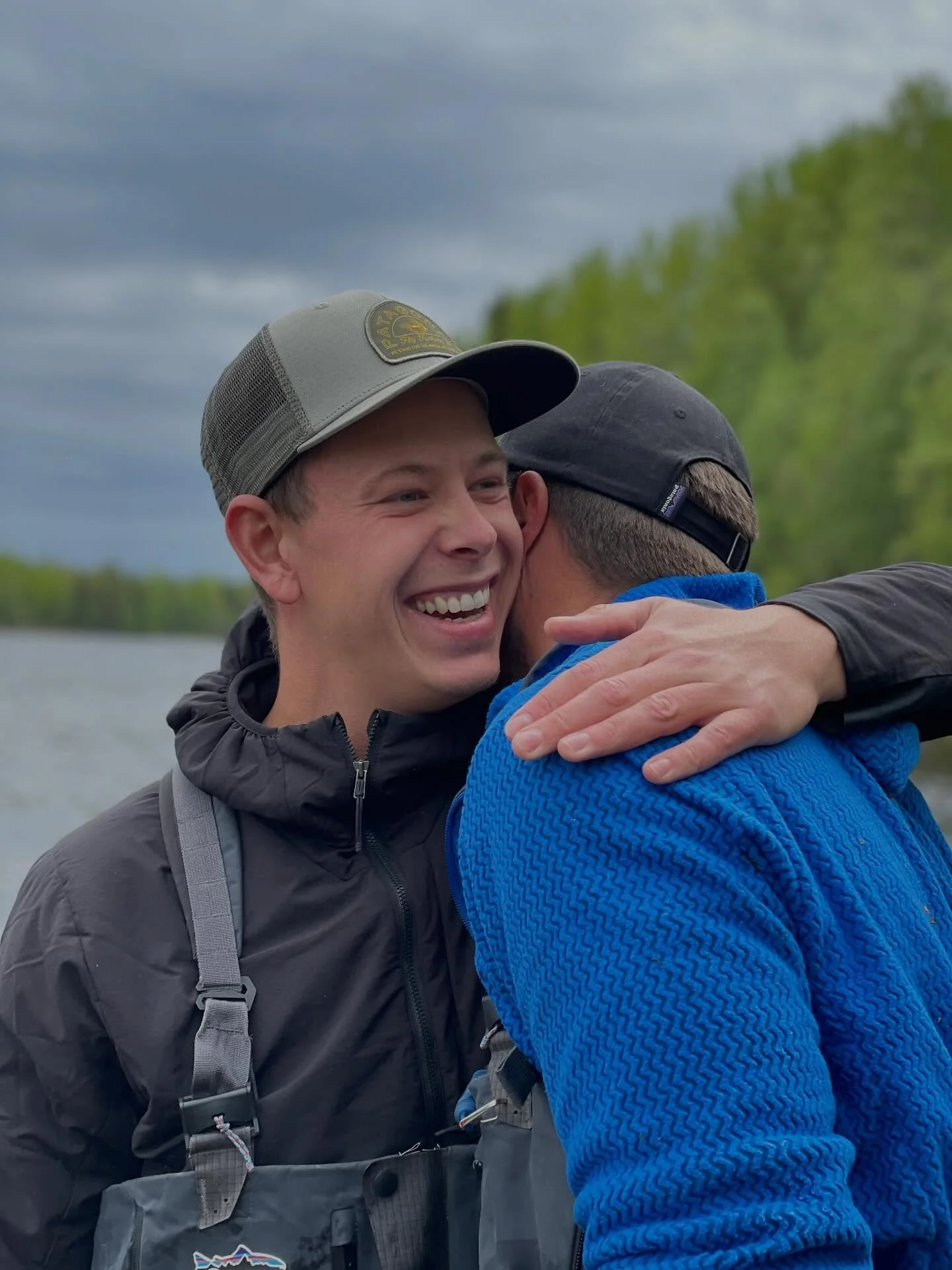 Memories last forever 

Between the wild running river and quiet, the friends found the moment. 

Silver breaking the surface, hearts pounding with the river&rsquo;s rhythm. 

In the hush of the river and the midnight sun, they held more than a fish.