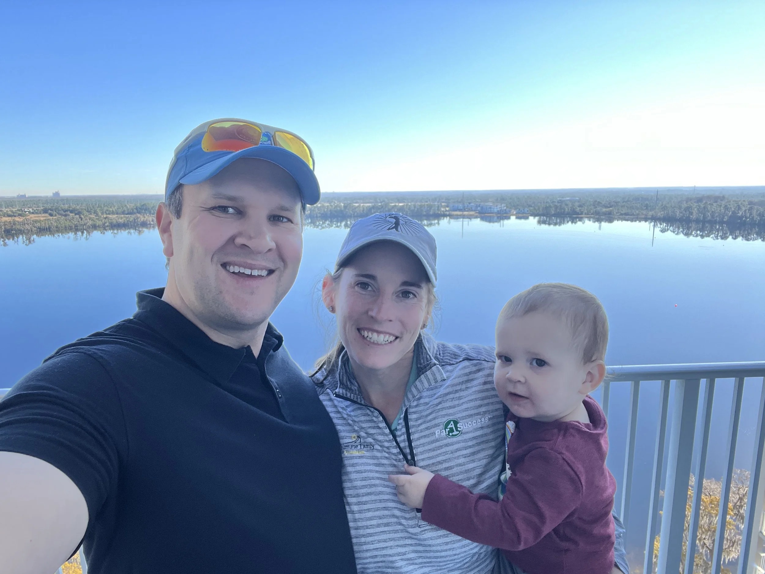 Katherine Perry-Hamski with husband and caddie Kevin and son John.