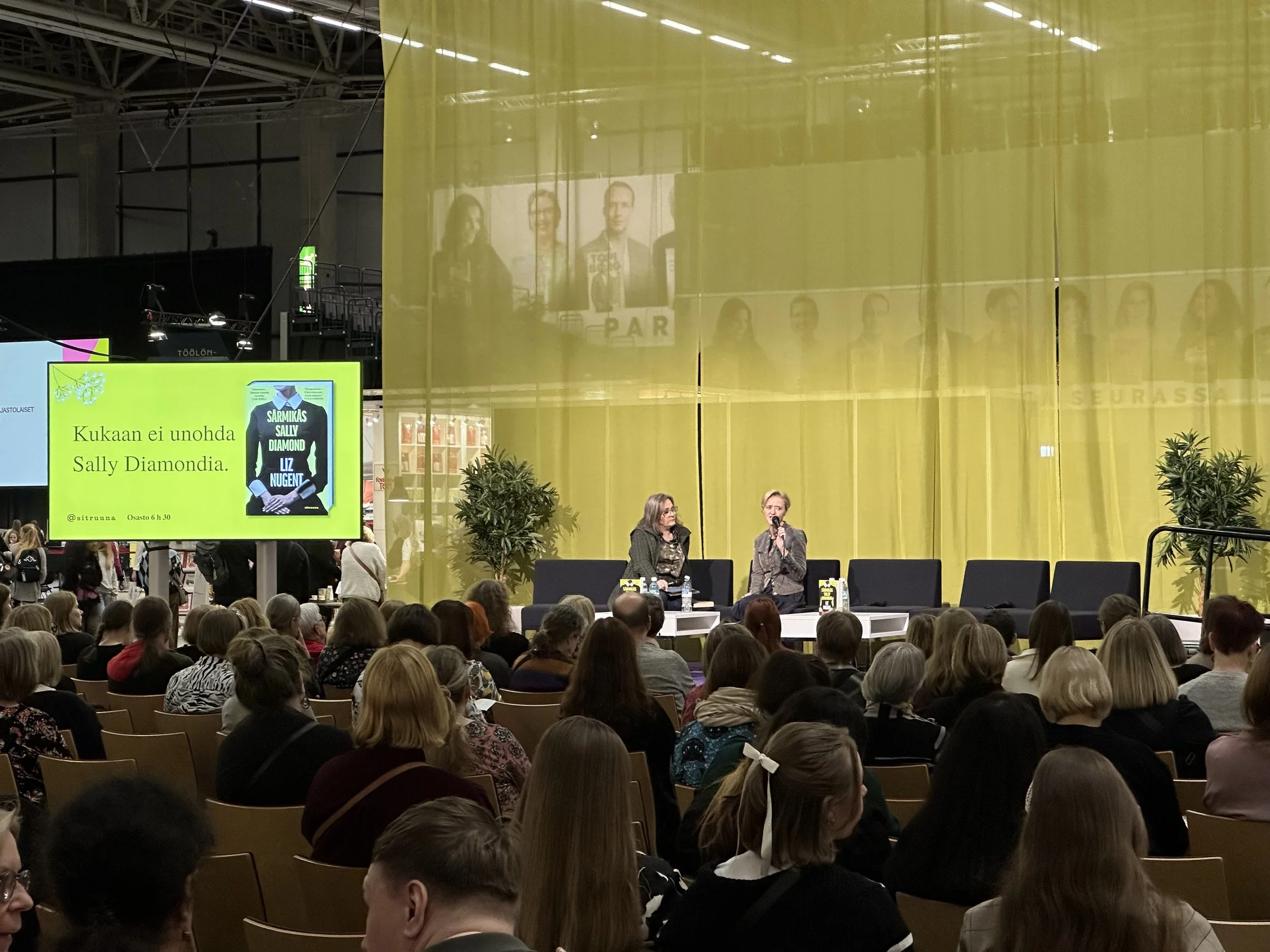 Liz and Mia Halonen on stage at the Helsinki Book Fair.