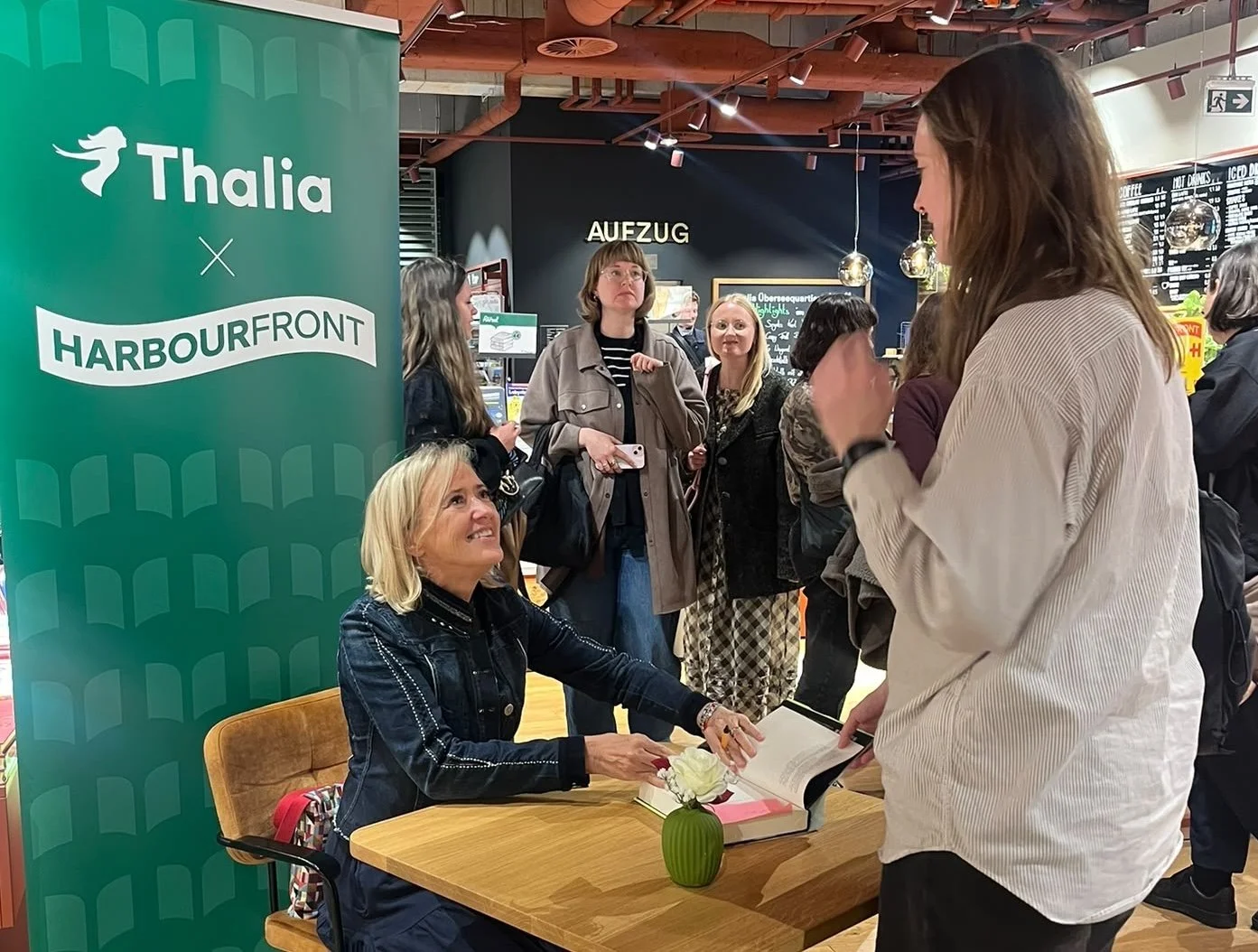 Liz meeting German readers at the signing table in Hamburg