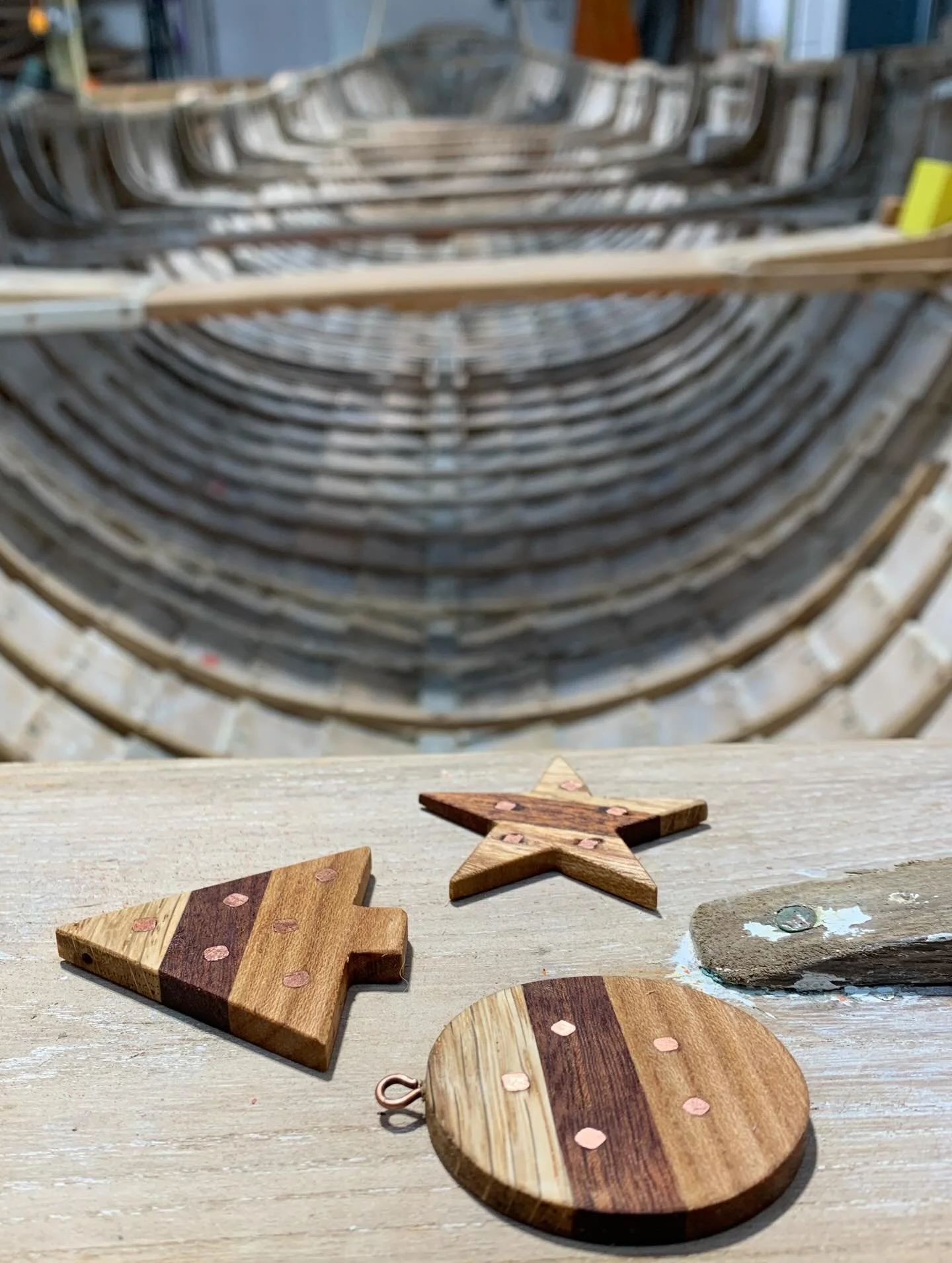 Most of this afternoon was spent sanding and oiling Christmas decorations ready for the St Agnes Mingle and Jingle on Friday and @limehouseyoga  Christmas Fayre on Sunday. 

The boat you can see in the workshop is a historic Cornish Pilot Gig, Active