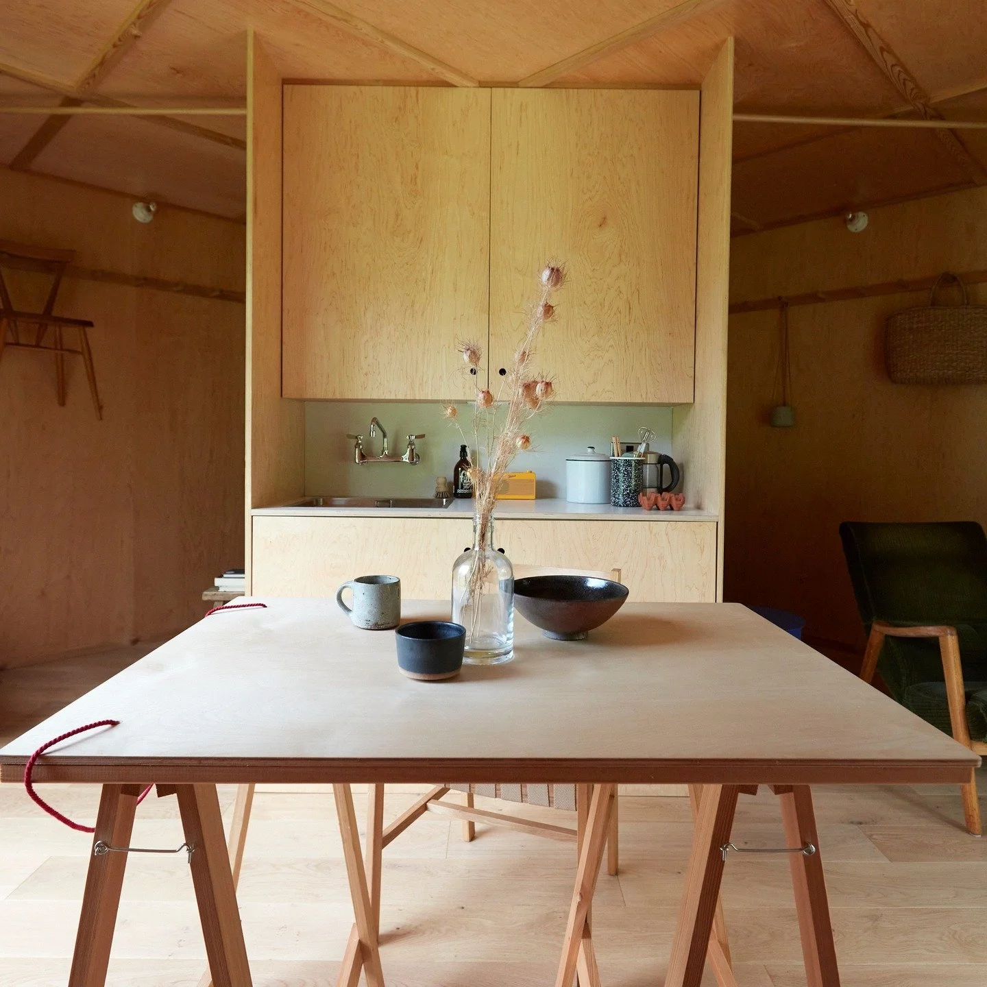 Praktyka is a small architectural retreat in North Devon &mdash; a place to step away from the noise and spend time with the people you love.

Guests stay in a geodesic dome, a design-led cabin, or a restored barn, all set within rewilded gardens and