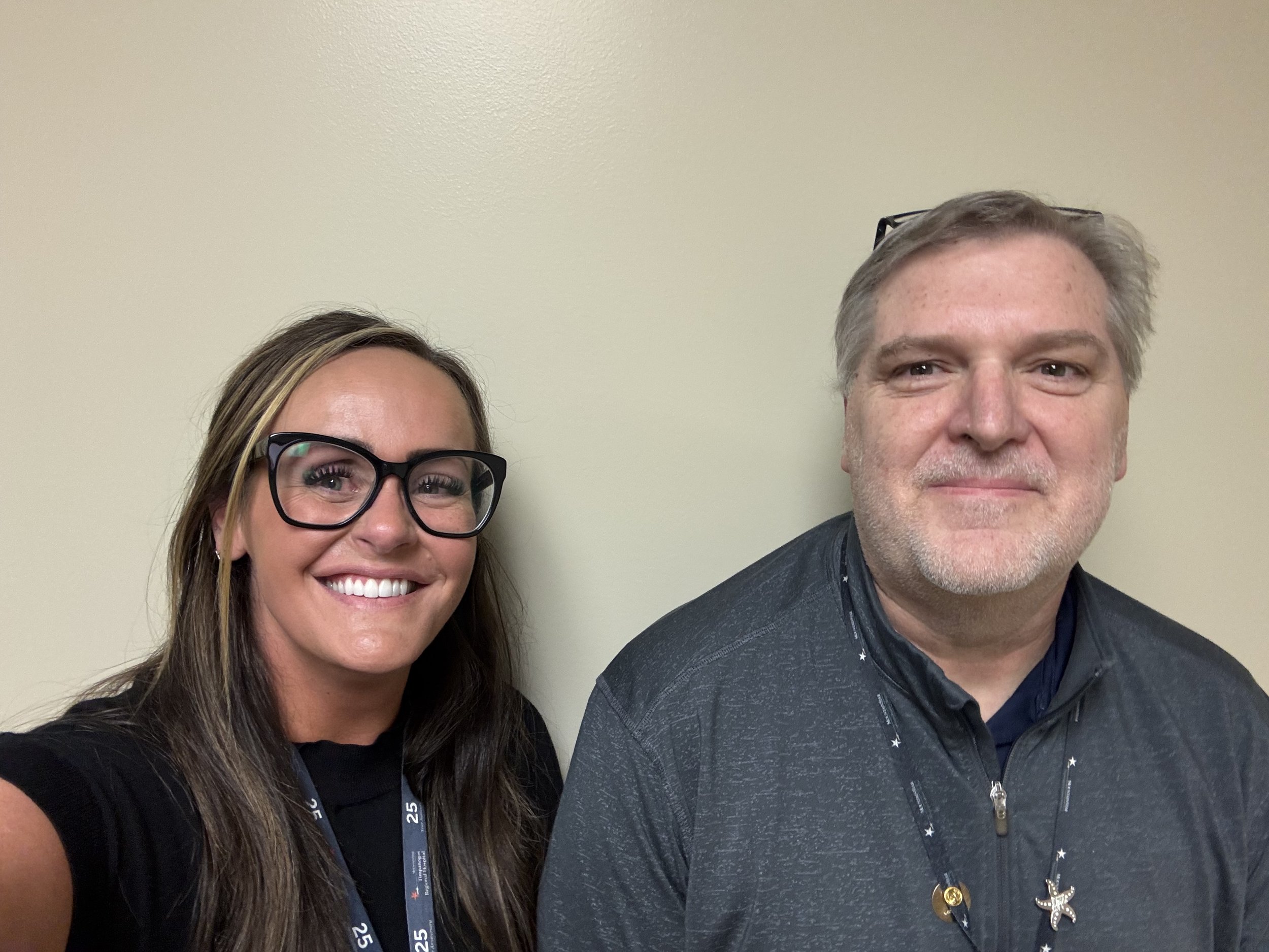 Lead Chaplain Manager Bradly Baird celebrates Timpanogos Regional Hospital Pediatrics and NICU Manager Christina Wright