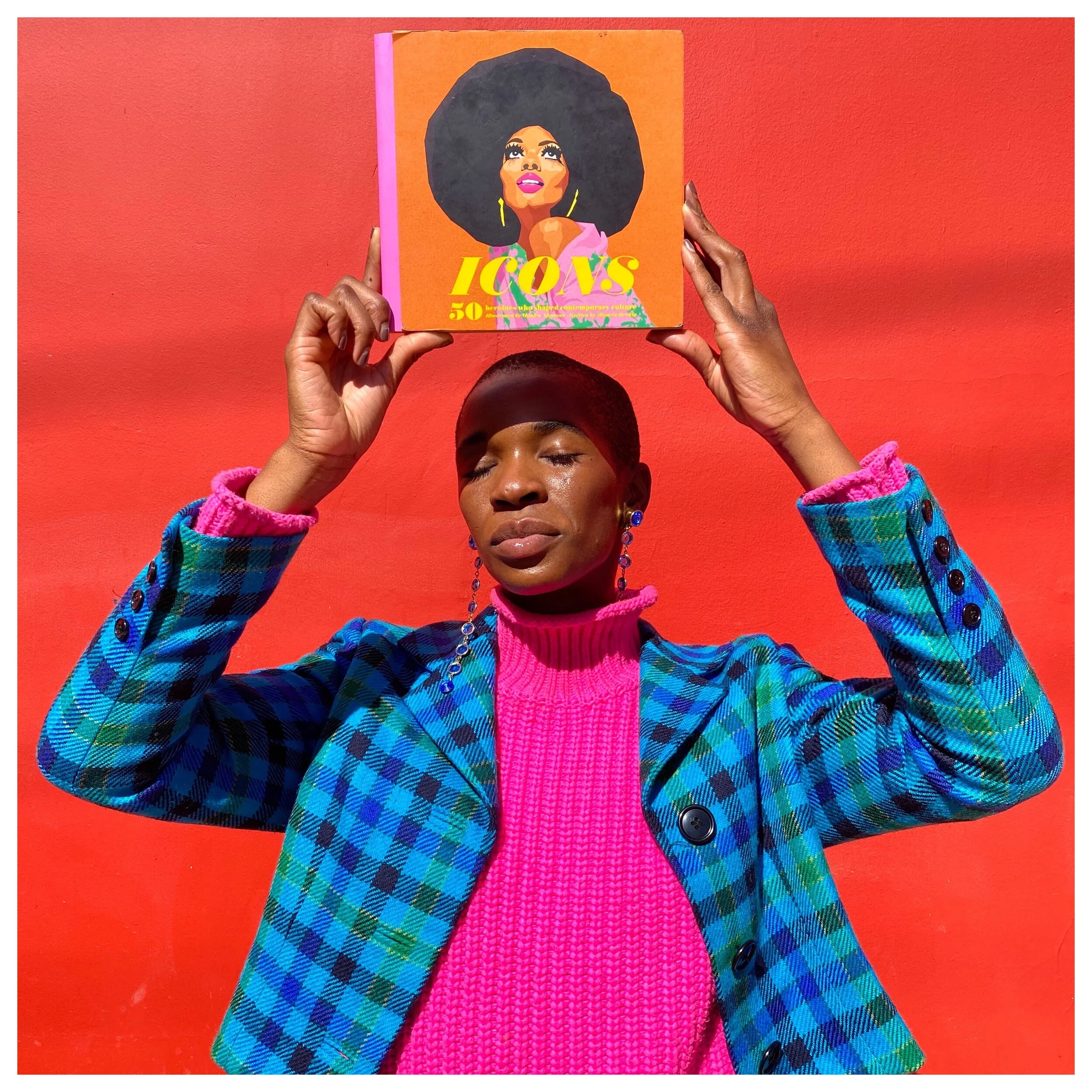 Monica Ahanonu and her book, Icons