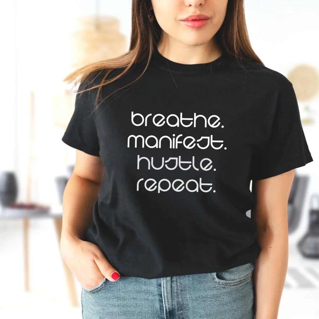 Breathe. Manifest. Hustle. Repeat. Black Tee