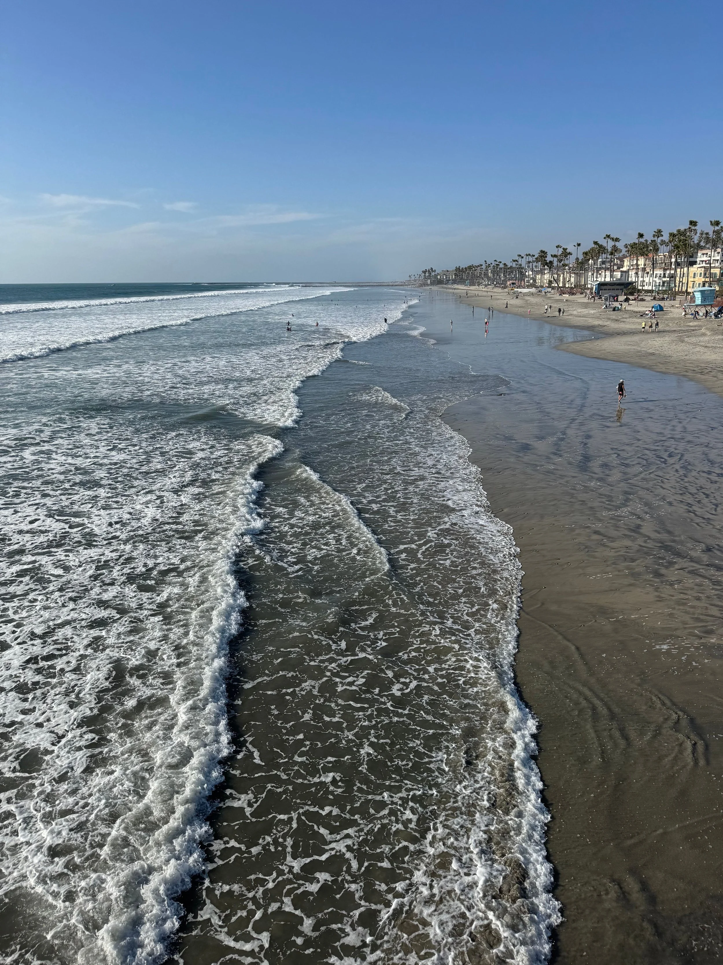 Beautiful sunny day with clear waters at Wisconsin Street Beach in Oceanside