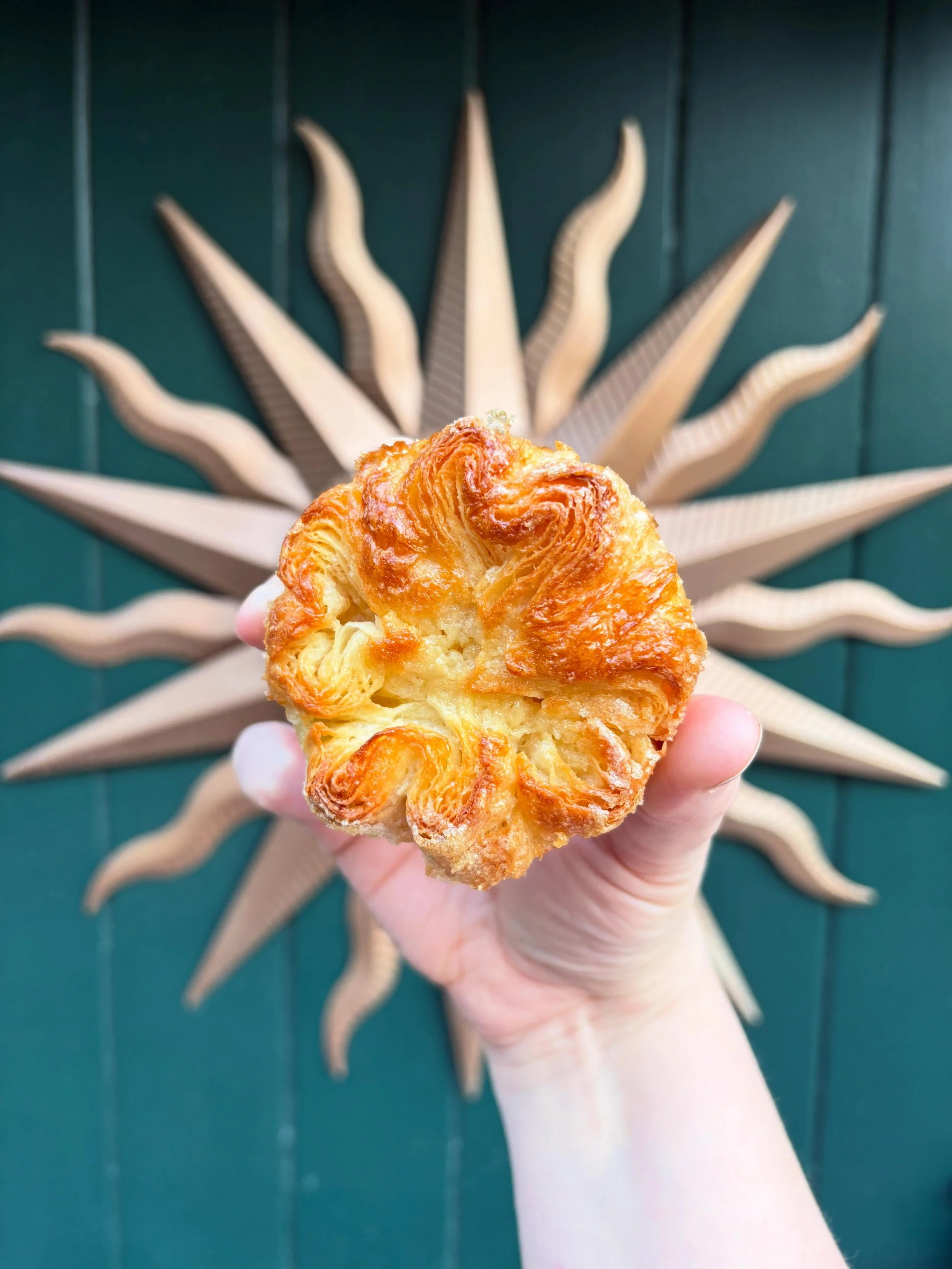 Kouign Amann: We get tons of questions about this beauty every weekend..let&rsquo;s talk about her!

🇫🇷 She showed up on the scene in 1860s France&hellip; Brittany, France, to be exact 

🧈 In the native Breton language, her name translates to butt