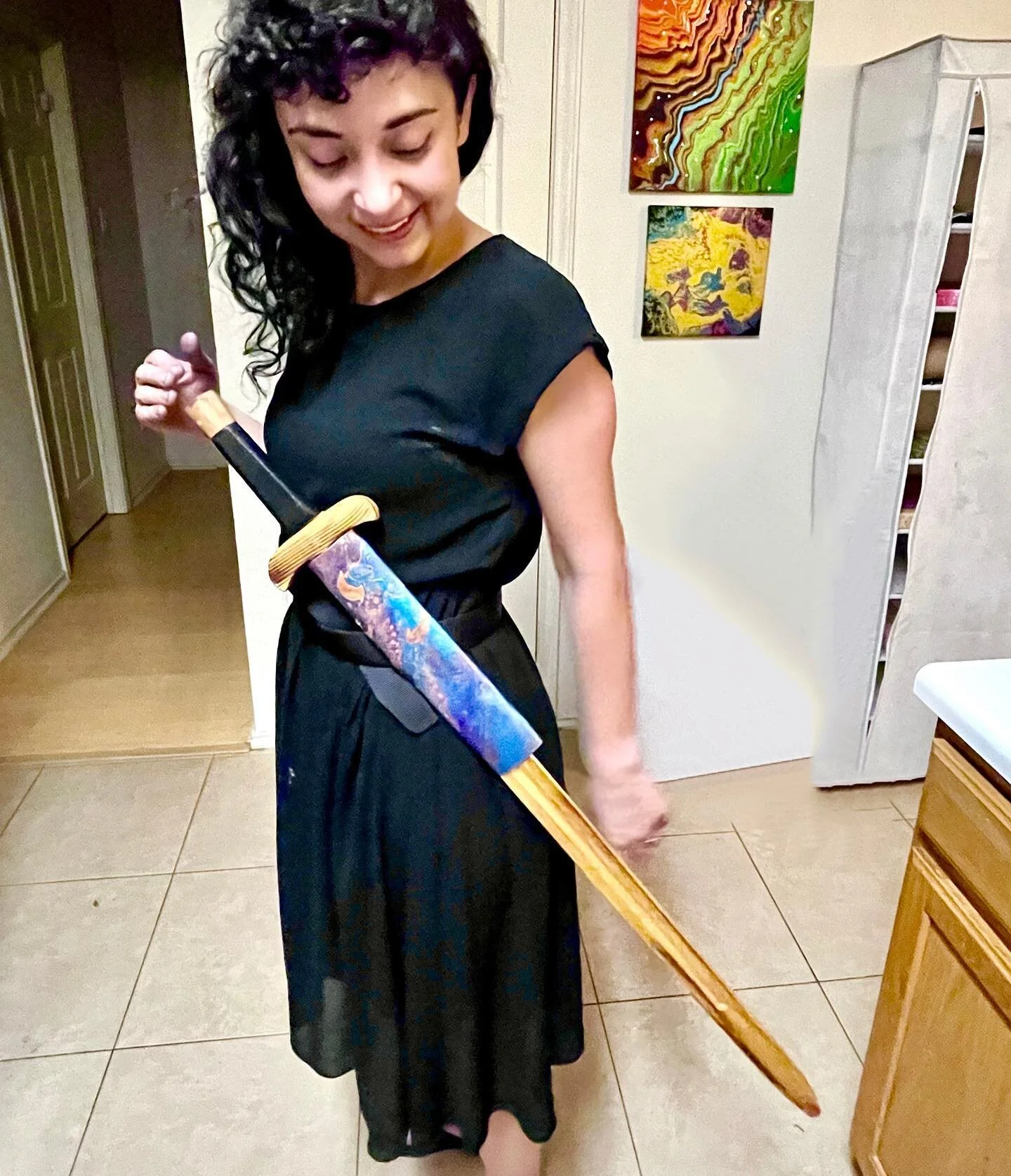 @ryansharif73 just fashioned a custom Paisley Art Collective scabbard, just in time for #sherwoodforestfaire 
.
.
#pourpainting #sword #dreambig #renaissancefaire #scabbard #medievalart #acrylicpouring