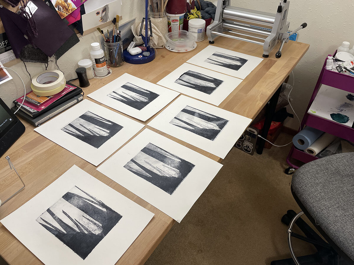 A run of seven prints for "Tiger Mountain: A Day". In the end, three prints were chosen to be a variable edition that showed the progress of light over a day.