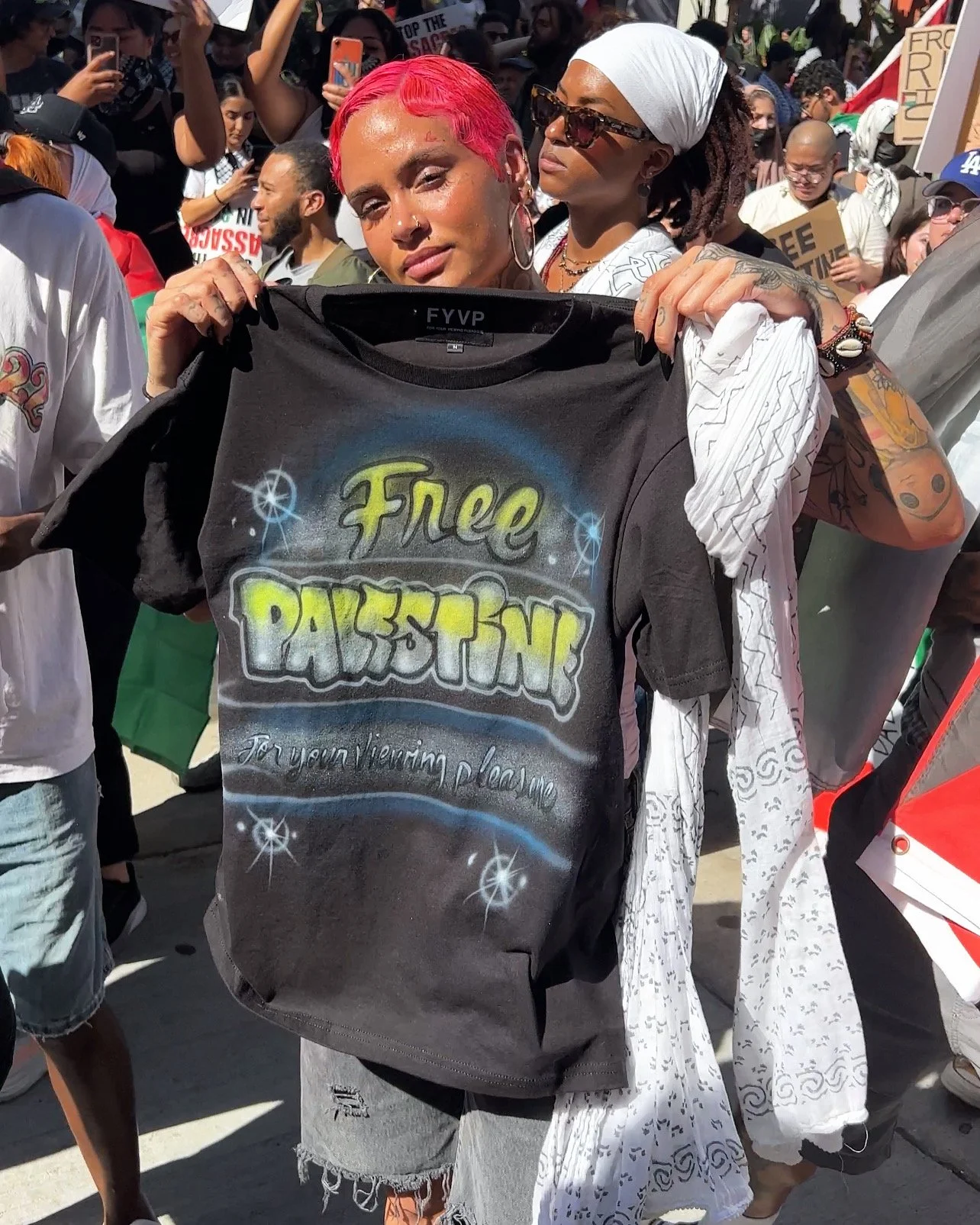 Kehlani with an FYVP tee at an LA protest.