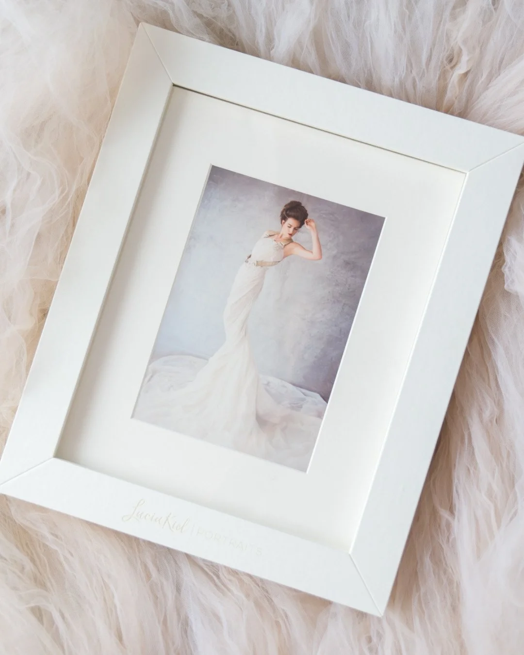 The photos we create together aren&rsquo;t meant to live on your phone.⁠
⁠
They&rsquo;re meant to be held. Displayed. Treasured.⁠
⁠
After your session, you&rsquo;ll be invited to a private **Portrait Reveal &amp; Ordering Appointment** &mdash; where 