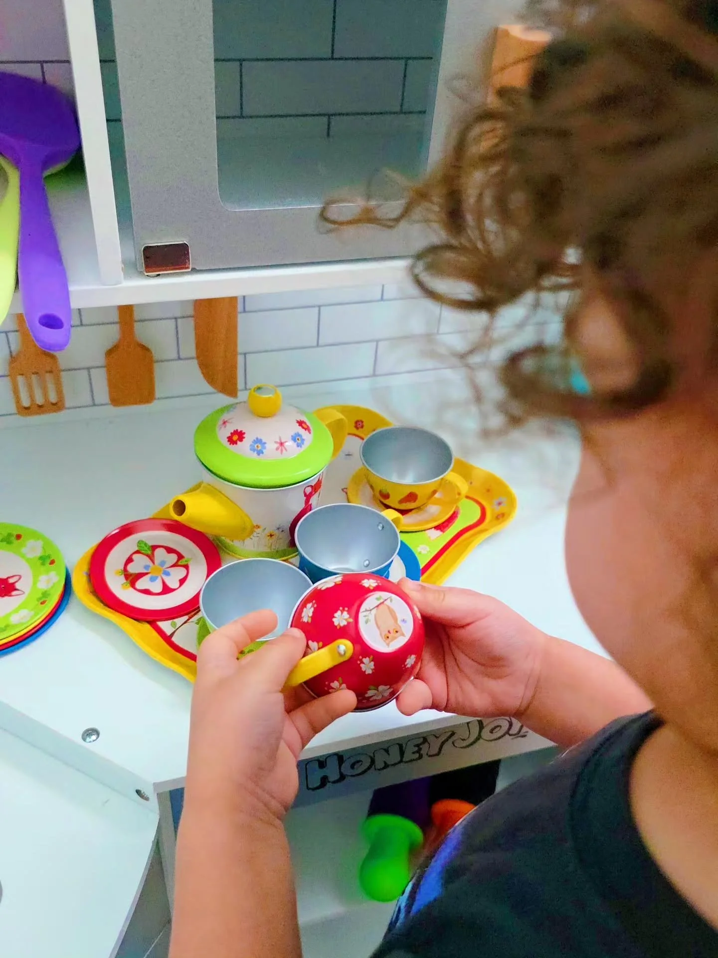 Little man is OBSESSED with this tea set. Whenever we go to the library he plays with the little toy kitchen so clearly he spends a lot of time in his toy kitchen here at home now. He needed some dishes so I set out on a quest to find the perfect tea