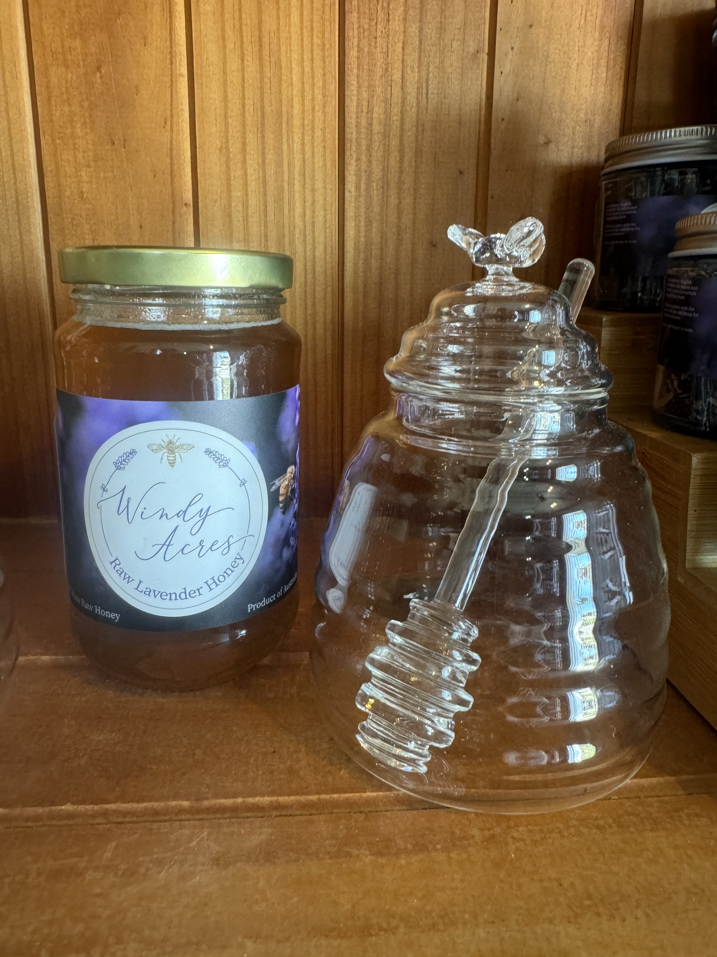 Glass honey jar and honey stick