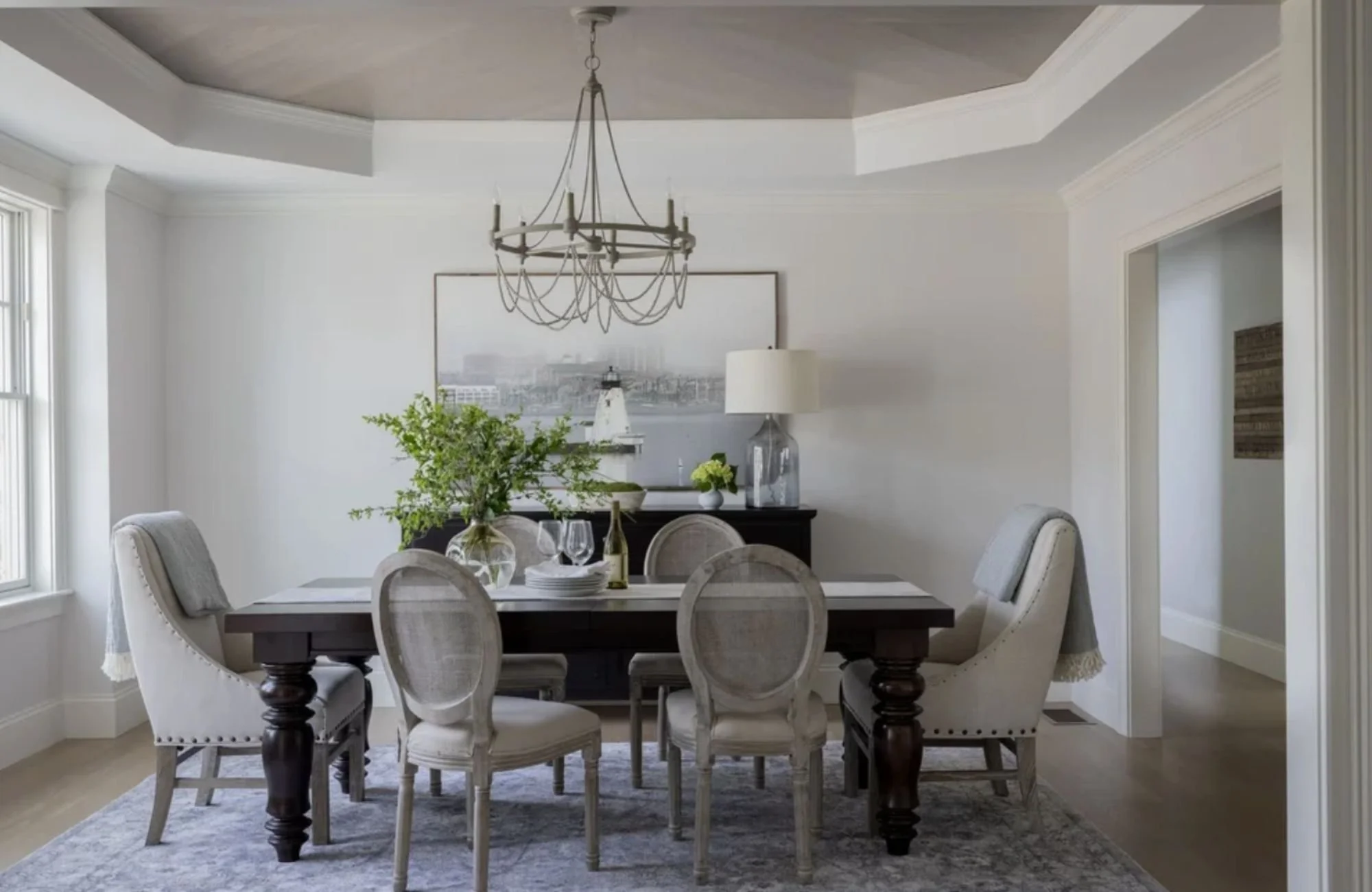 ironwood-studio-cape-cod-ma-wood-finishes-dining-room-with-vaulted-ceiling-timeless-details-upholstered-chairs-sophisticated-renovation.jpg